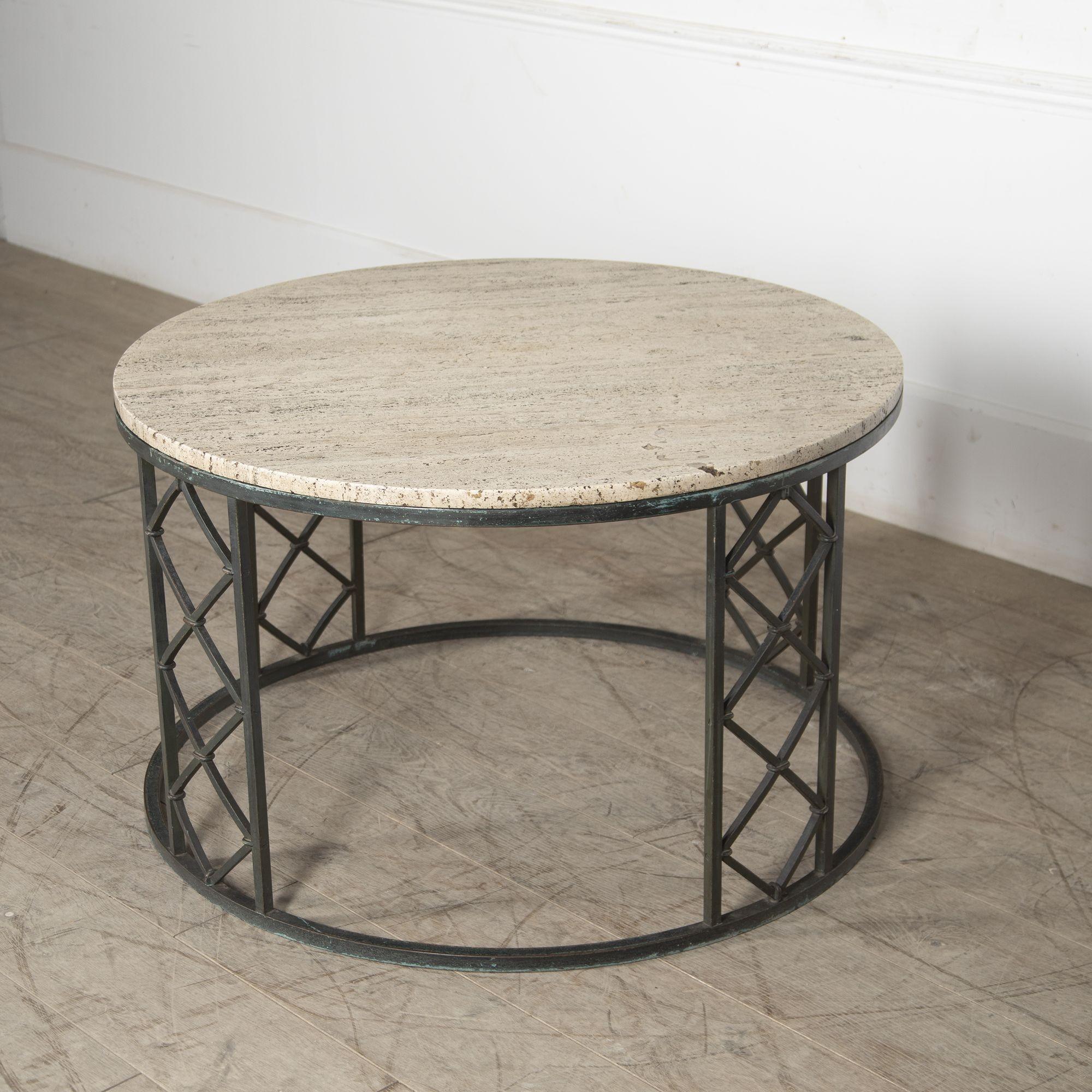 Fabulous 1940’s French high coffee table.
With a wrought iron frame and a porous travertine top, this gorgeous coffee table would make a very elegant piece in any living space.