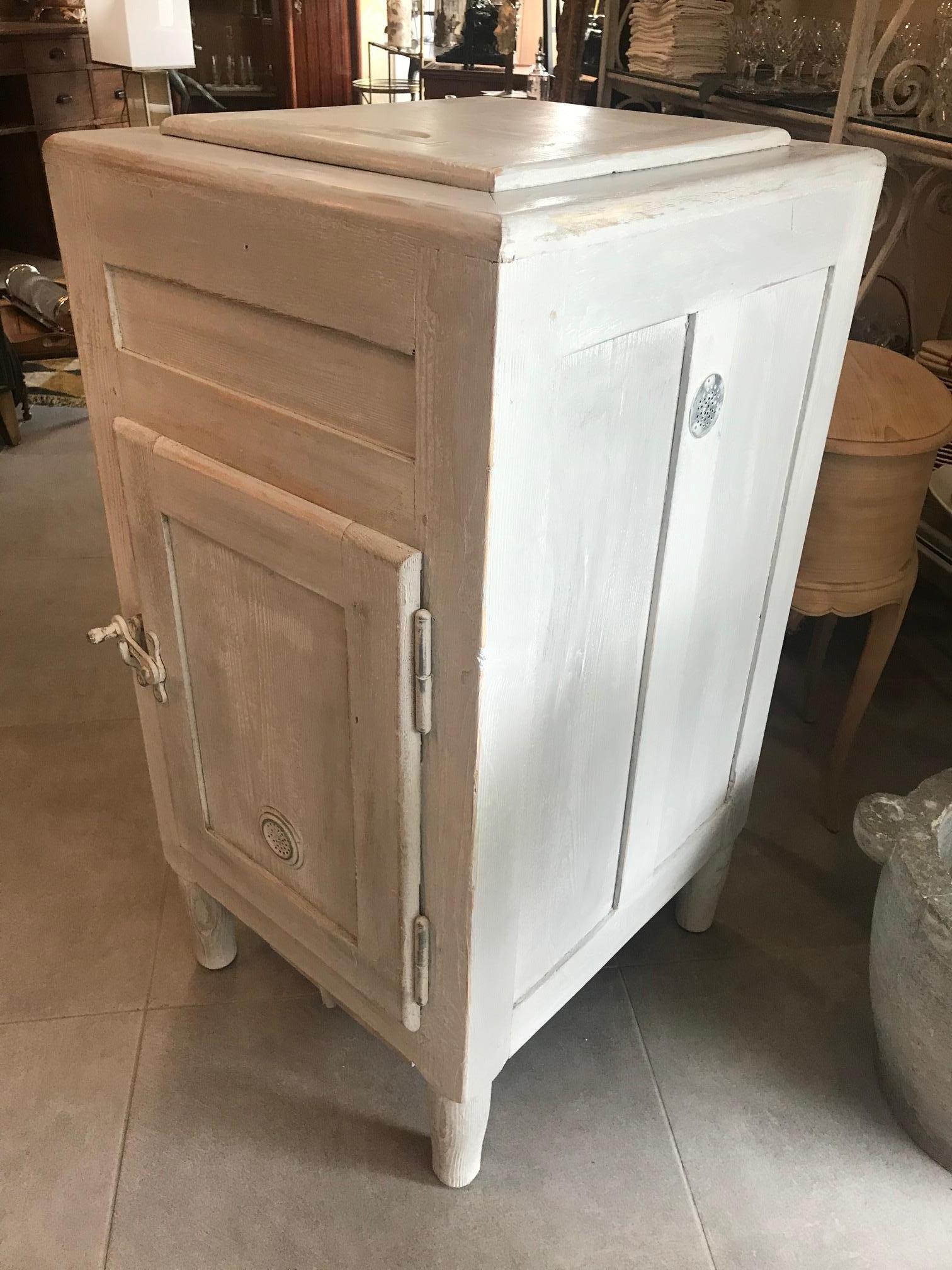 Nice 20th century French cooler or Fridge from the 1900s. 
Used to keep ices cubes and collect fresh water with the small tap at the bottom. 
The top is openable and there is zinc inside. 
The main door is openable and there is zinc inside also