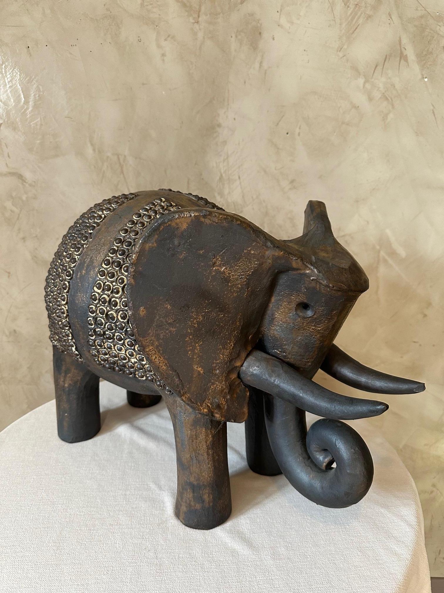 Rare and unique piece dating from the 2000s!! 
Large Ceramic elephant signed by Dominique Pouchain.
Incredible ceramic work. The back of the elephant is carved with a pearl pattern.
Slight accident on a defense. Possibility of acquiring a smaller
