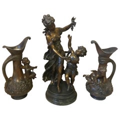 Antique 20th Century French Emile Bruchon Spelter Set of a Sculpture and Two Jars