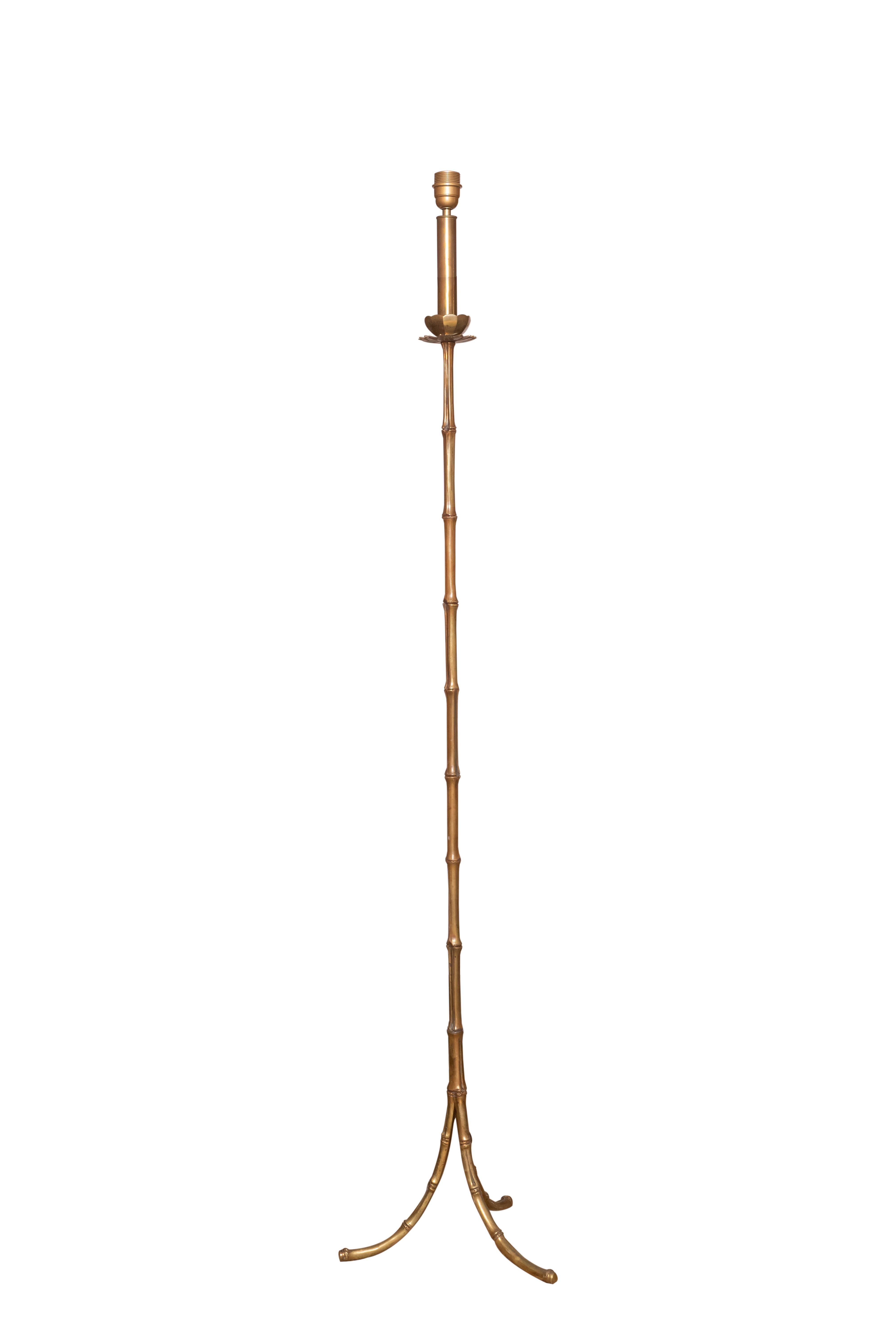 A 20th century Maison Baguès bronze faux bamboo floor lamp.
Maid on solid bronze faux bamboo rests on a tripod leg. With a 