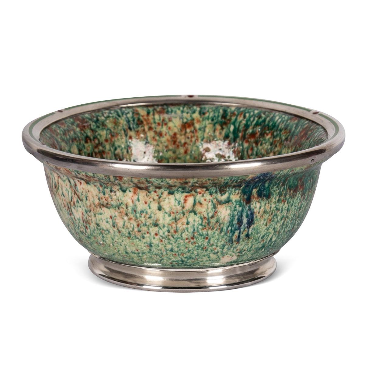 Antique early-20th Century silver mounted bowl, flambé glazed ceramic bowl in a multitude of colours and silver mounted, applied with green and red champlevé enamel. Signed underneath Boulognes, Desvres Boulogne s/Mer. Hallmarked French silver