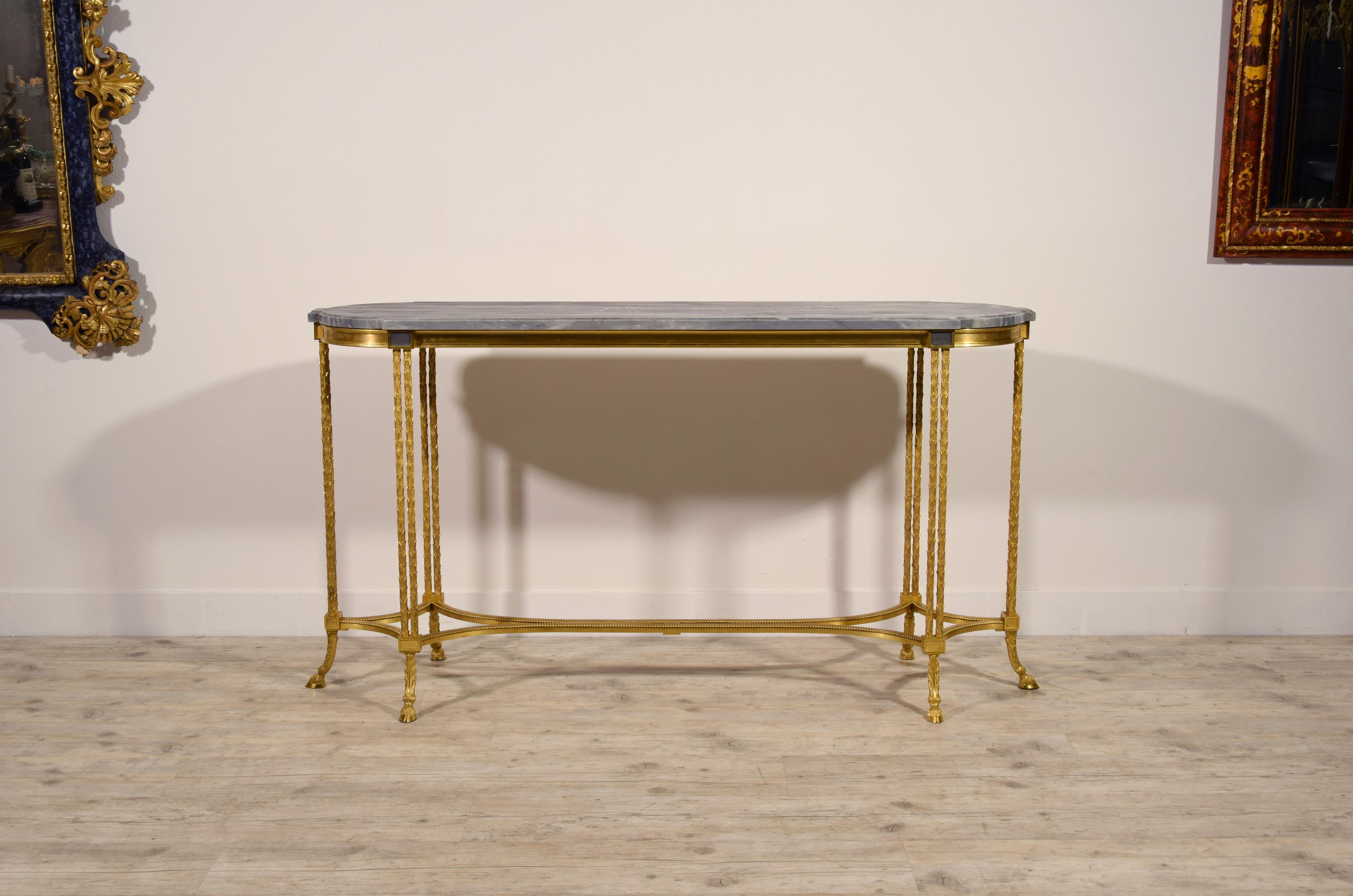 20th century, French gilt bronze console table by Maison Baguès

The refined and rare console table, made by the famous Maison Baguès manufacturer, consists of an oval shaped top in Turquin blue marble, from the blue grey coloration and from a
