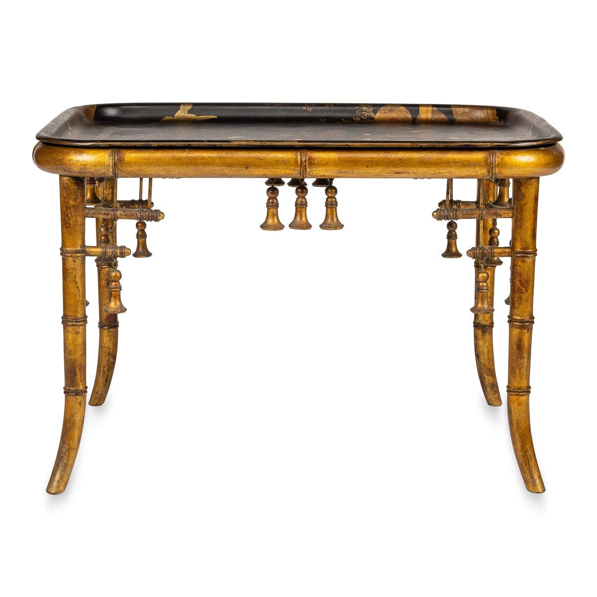 Antique late 19th Century French gilt wood tea table with Japanese style lacquer tray. This portraying a group of Japanese geisha's and nobility, flowering trees, lanterns and a white dove flying overhead. The gilt wood stand imitating bamboo and