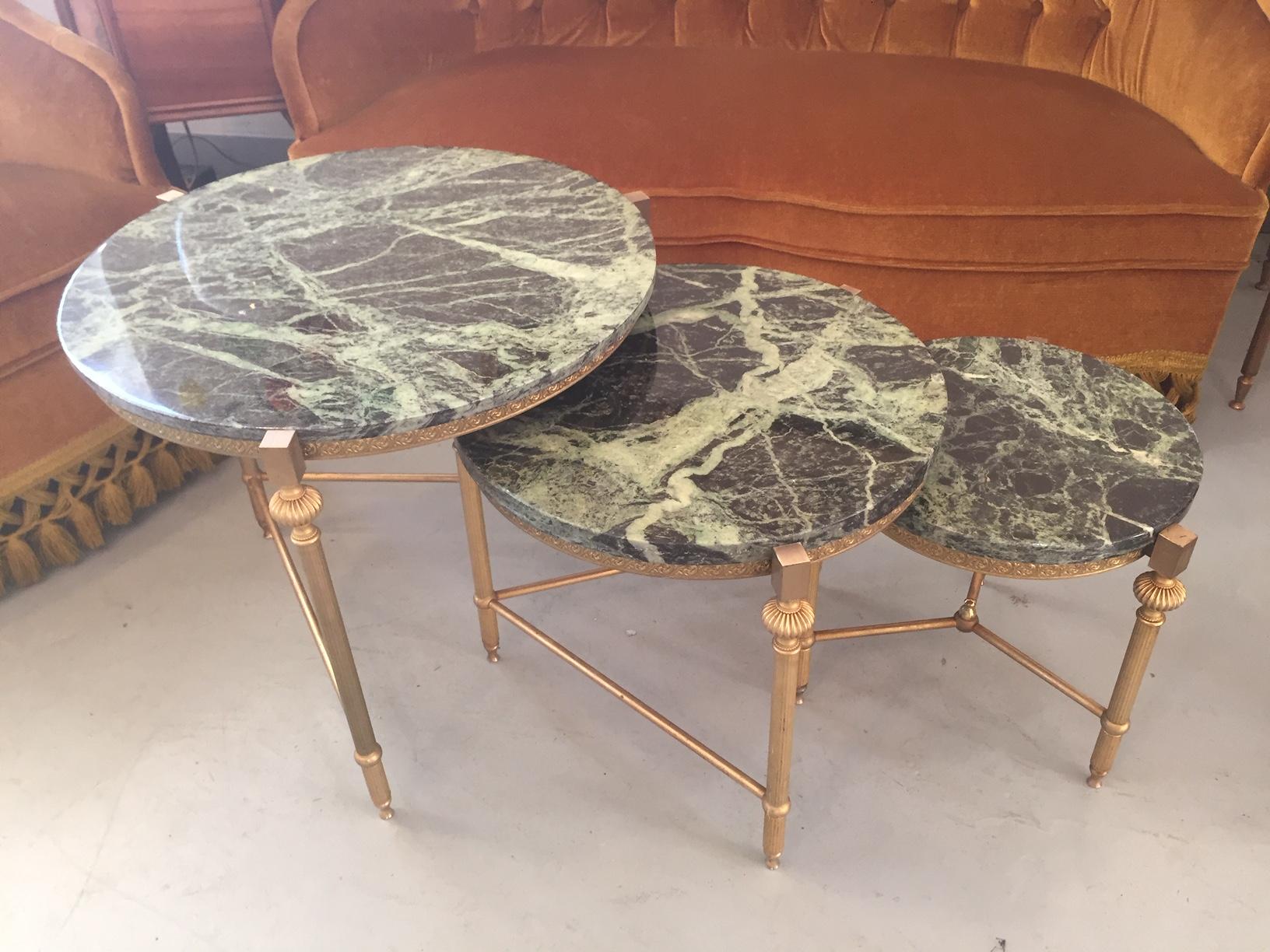 Beautiful 20th century, French gilded brass and Green marble nesting table from the 1950s. 
Very nice veined green marble (one glow on the middle table marble)
Very high quality.