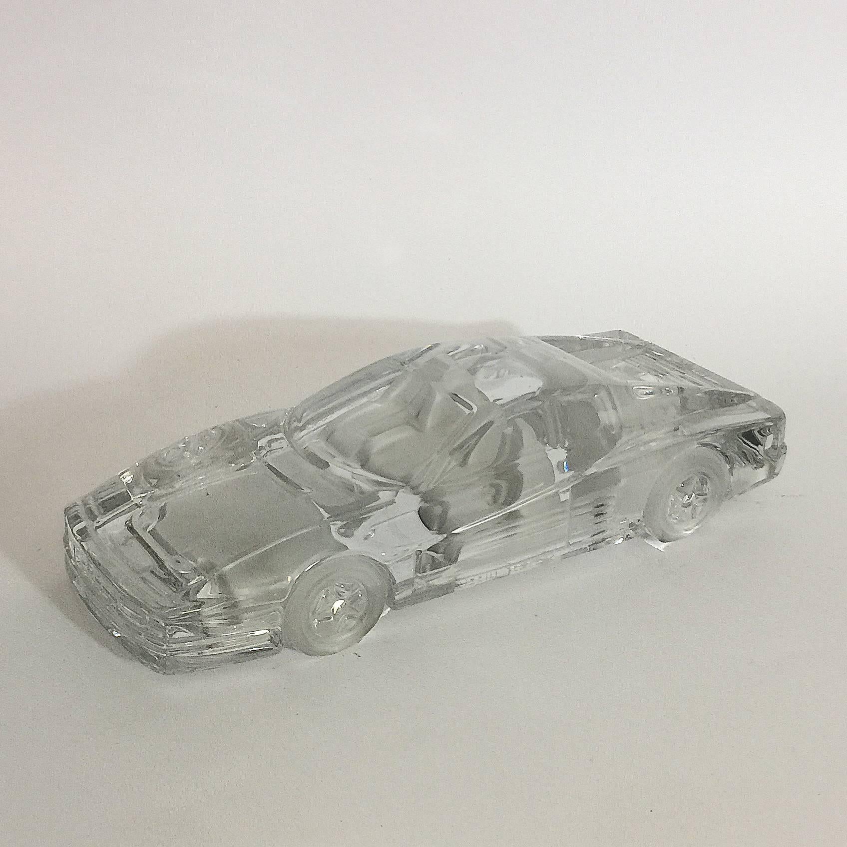 Clear and frosted glass car, Ferrari Testarossa
Engraved “Creation Claude Nicolas Paris”
Model in crystal made for the atelier Daum, Paris
French manufactory, late 20th century.
   