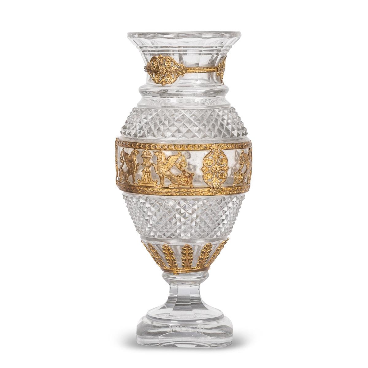 Antique early-20th Century French Baccarat crystal glass & ormolu mounted vase with empire style mounts.

CONDITION
In Great Condition - No Damage.

SIZE
Height: 36cm
Diameter: 17cm.