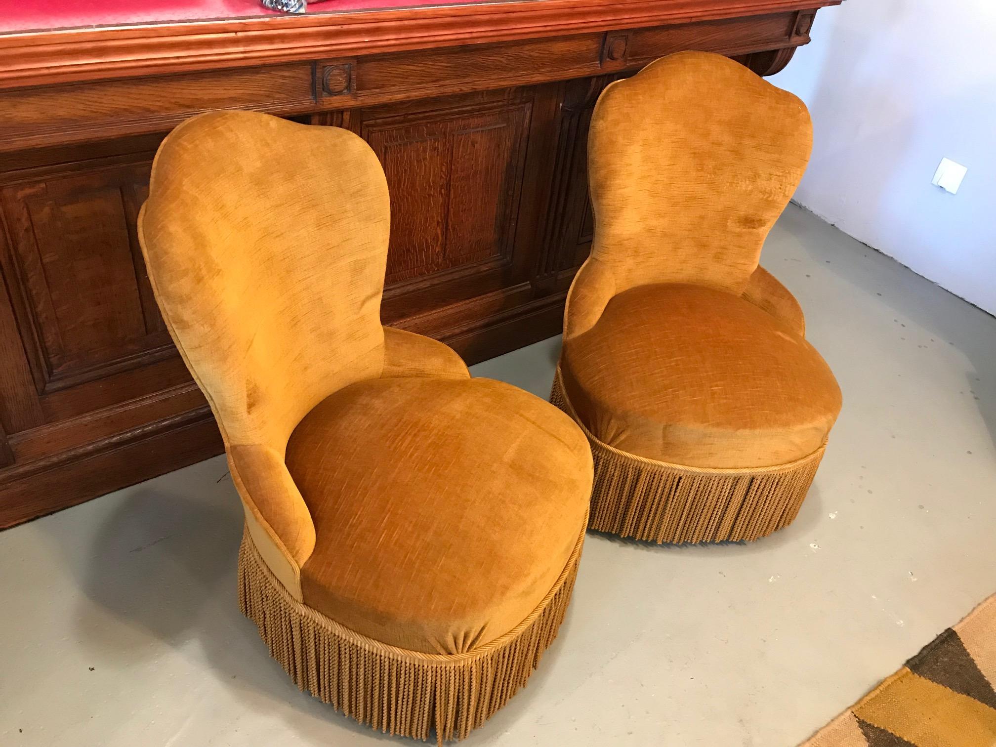 Very nice 20th century French golden Fabric pair of armless chair from the 1950s.
Original fabric. Vintage armchair with fringes. Good quality.