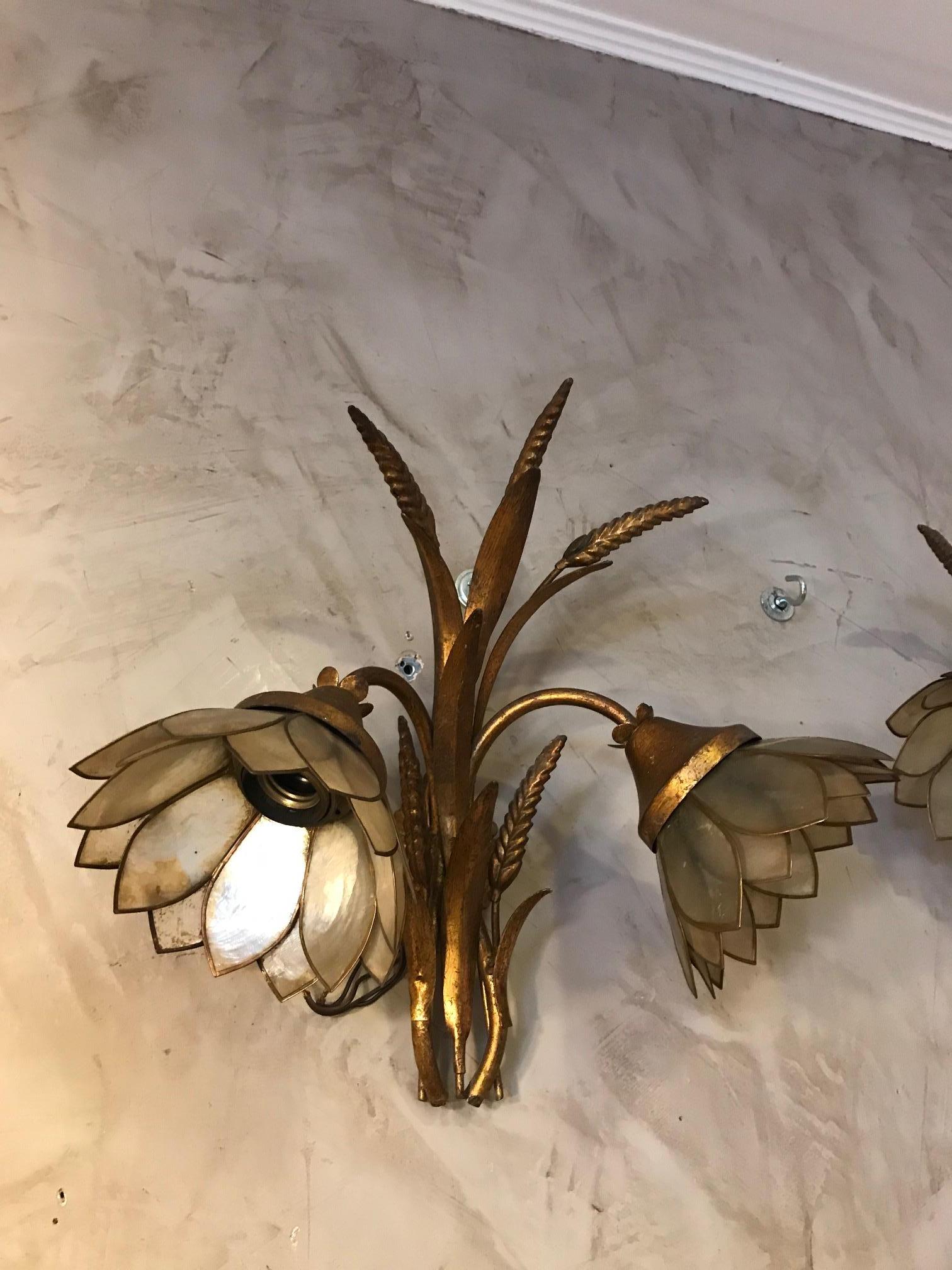 Very nice 20th century French golden metal and mother of pearl wall lights from the 1980s. 
Earn of corn shape. 
Nice quality and condition.
 