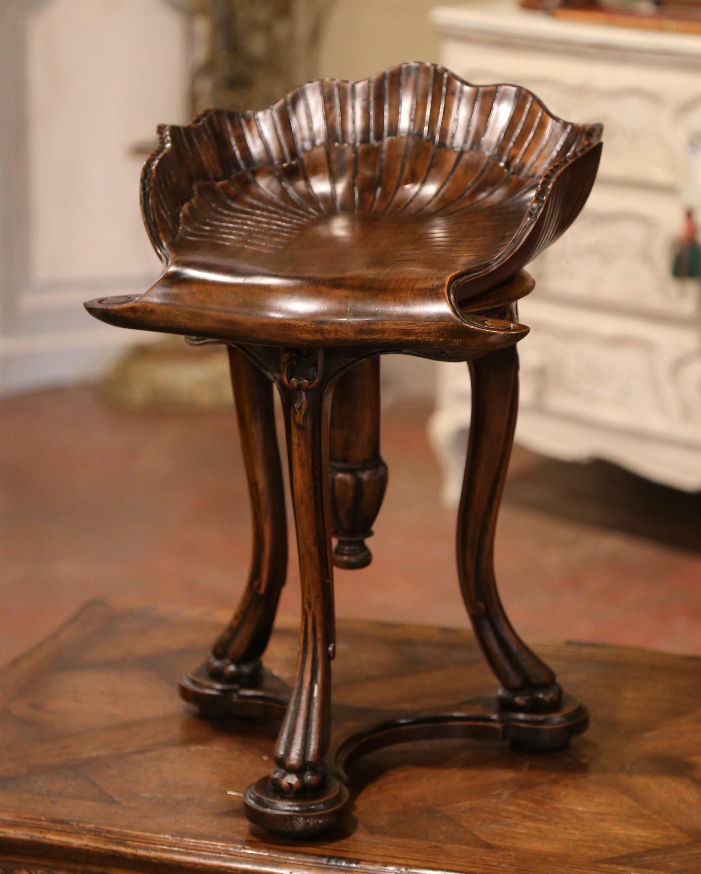 Patinated 20th Century French Hand Carved Walnut Piano Grotto Stool with Shell Motif