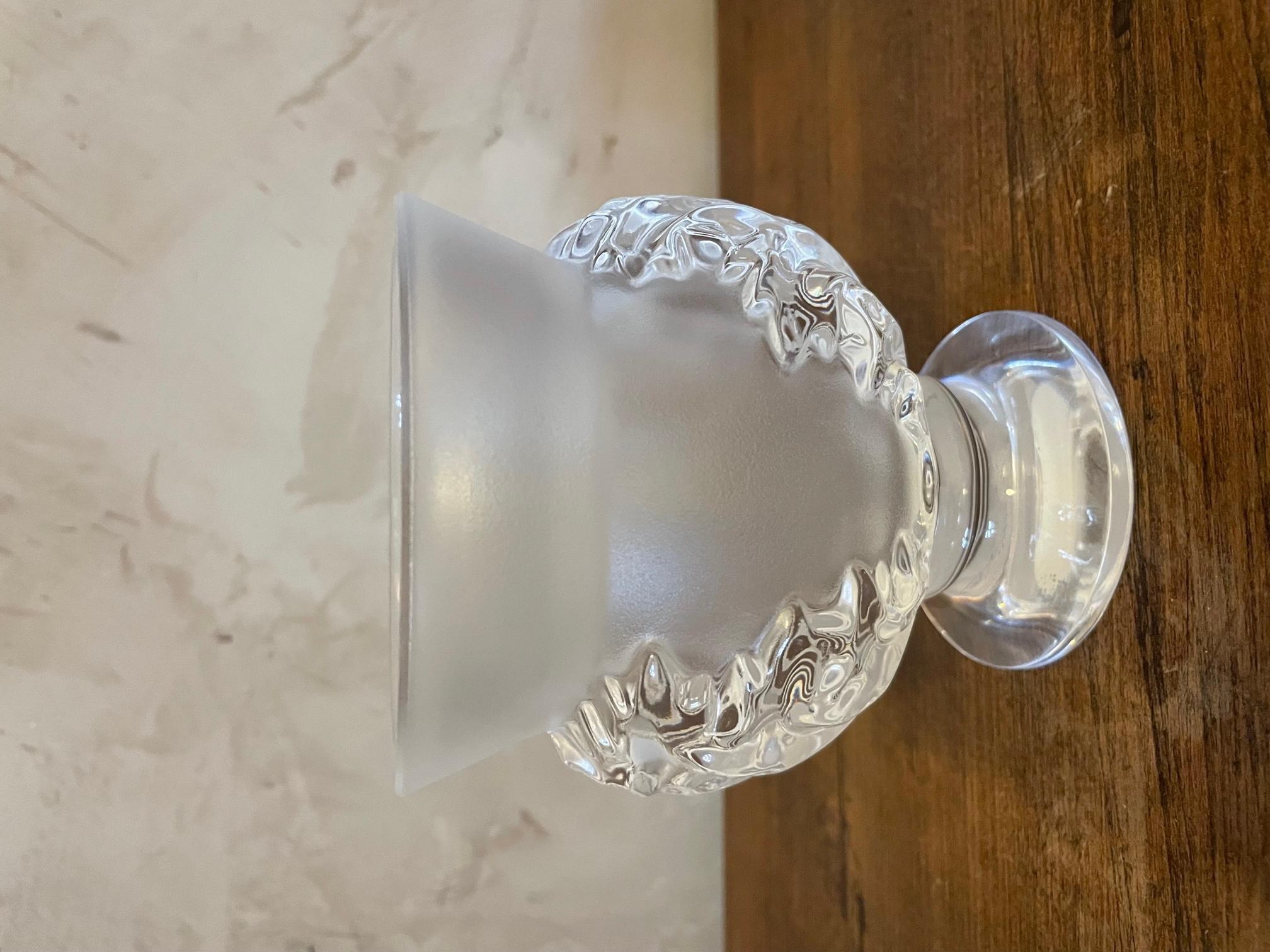 Beautiful small vase on pedestal René Lalique vase signed under the base. Made with molded blown white glass partially patinated opalescent. 
Model with acanthus leaves decoration. 
Very good quality and condition.