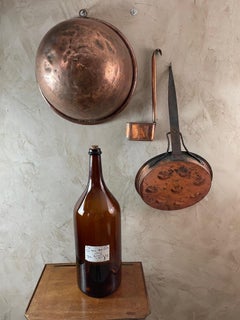 20th century French Large Amber Glass Bottle