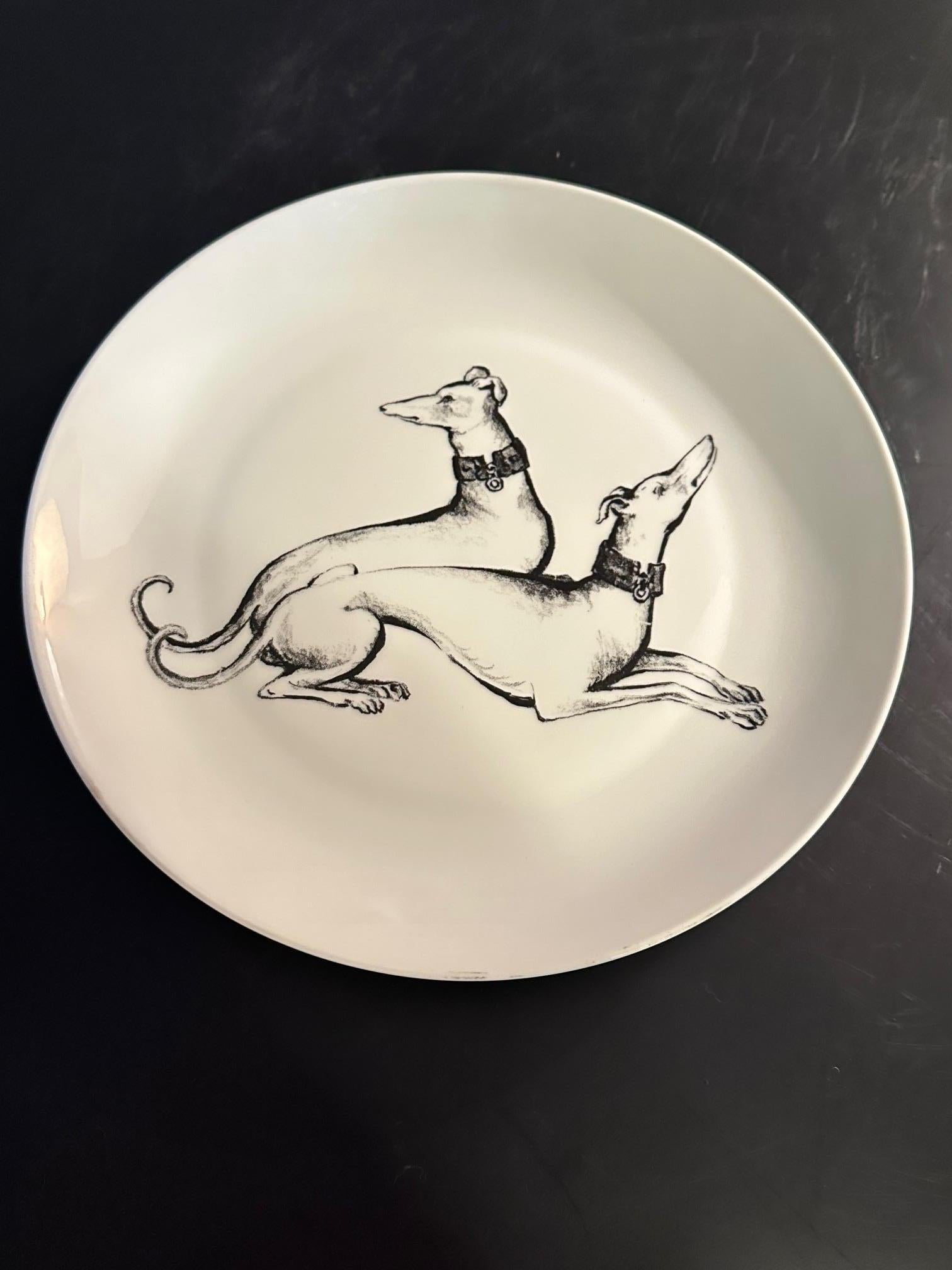 Large flat white plate in Limoges porcelain, signed NBD.
Representing two lying greyhounds.
Good quality and rare model.