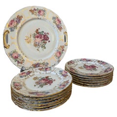 20th Century French Limoges Set of Twelve Porcelain Plates and Plater