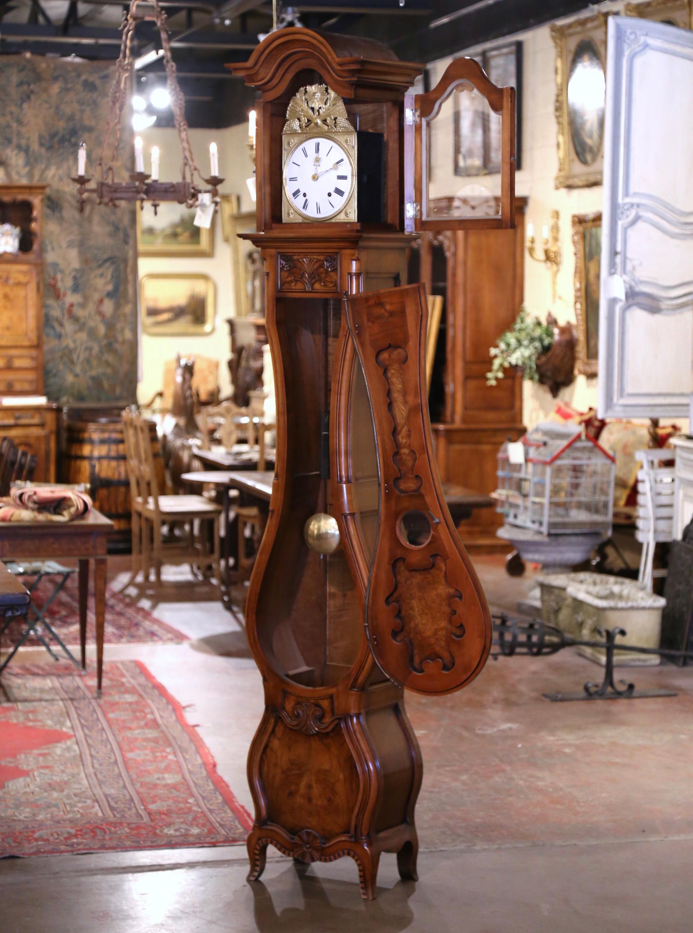 Crafted near Lyon, France, circa 1980 and built of burl wood, the vintage tall 