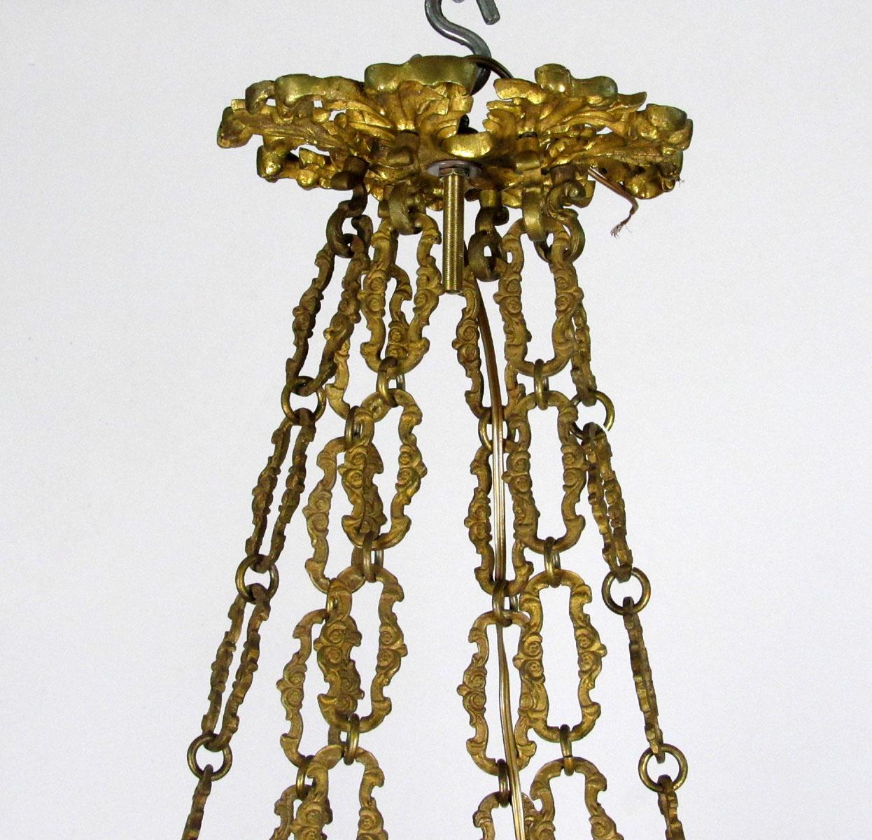 French Louis XV style gilt bronze 18-light chandelier.
