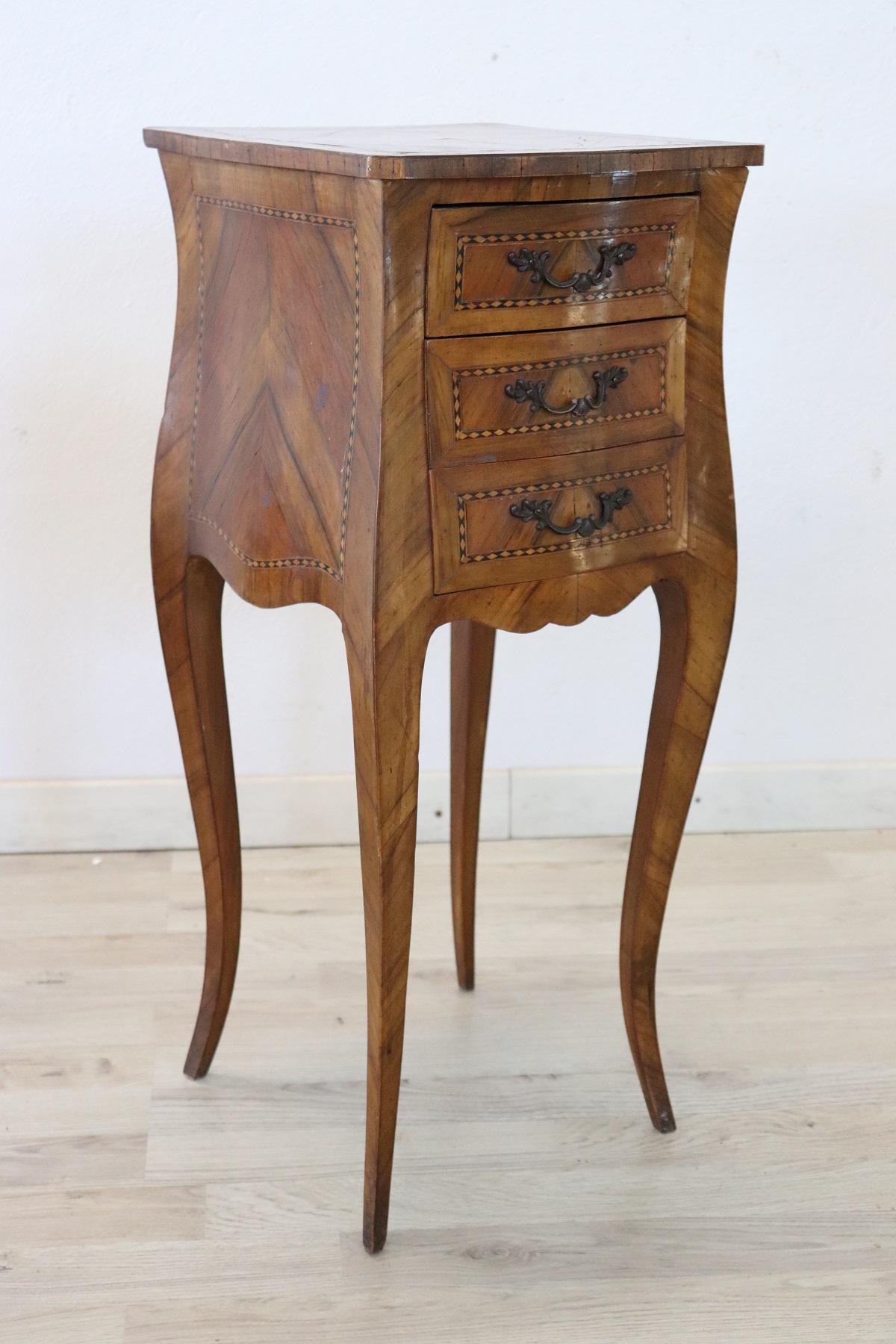 Rare and fine quality French Louis XV style 1970s side table or nightstand in inlaid wood with the particular bean shape, the legs are long and slender. The decoration is on each side you can also place it in the center of the room. Inlay walnut