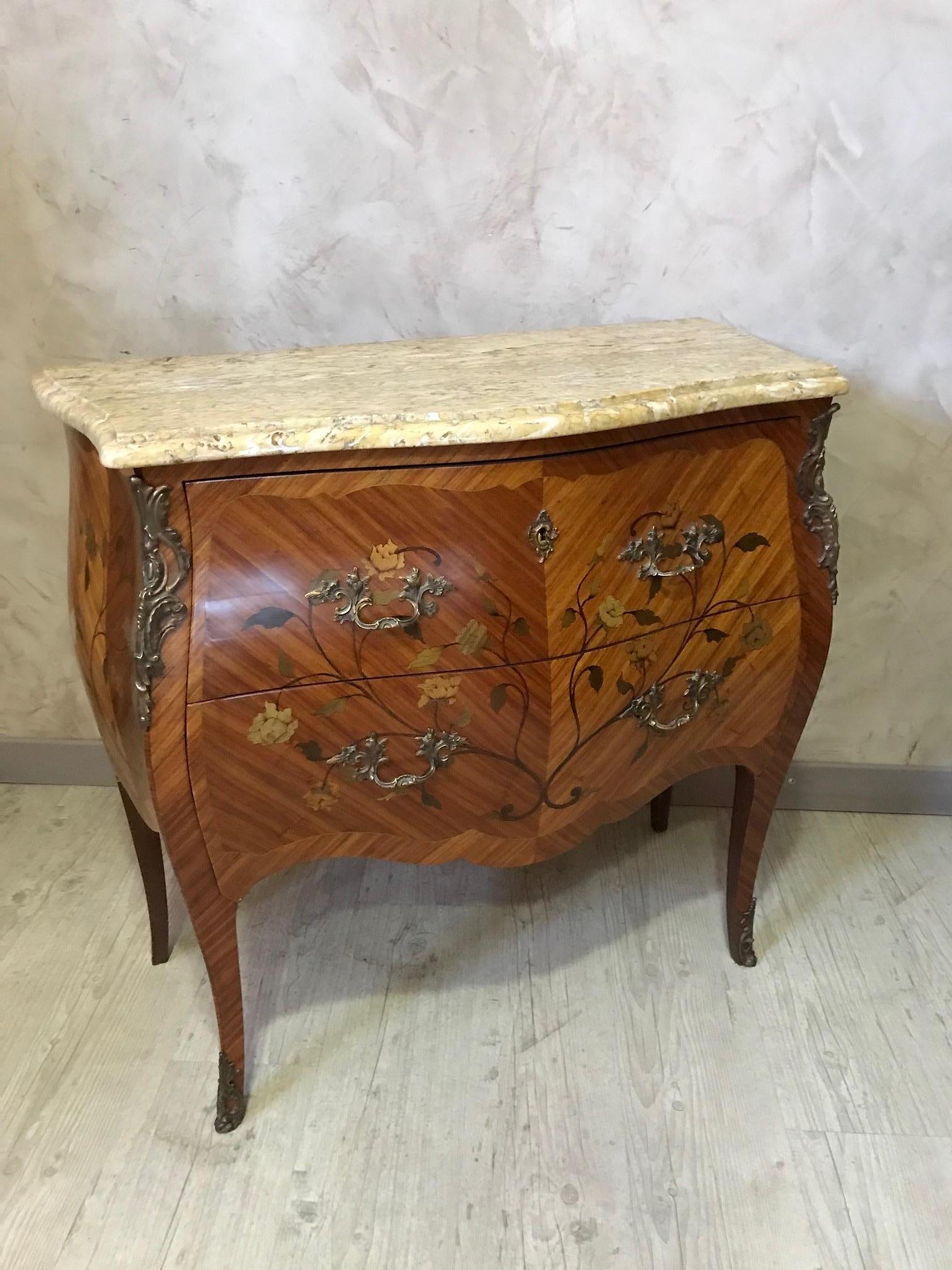 Very nice 20th century French Louis XV style marquetry commode from the 1950s.
Two large drawers. Beautiful removable marble top.
Nice flowers walnut marquetry. Bronze handles.
Beautiful quality.
 