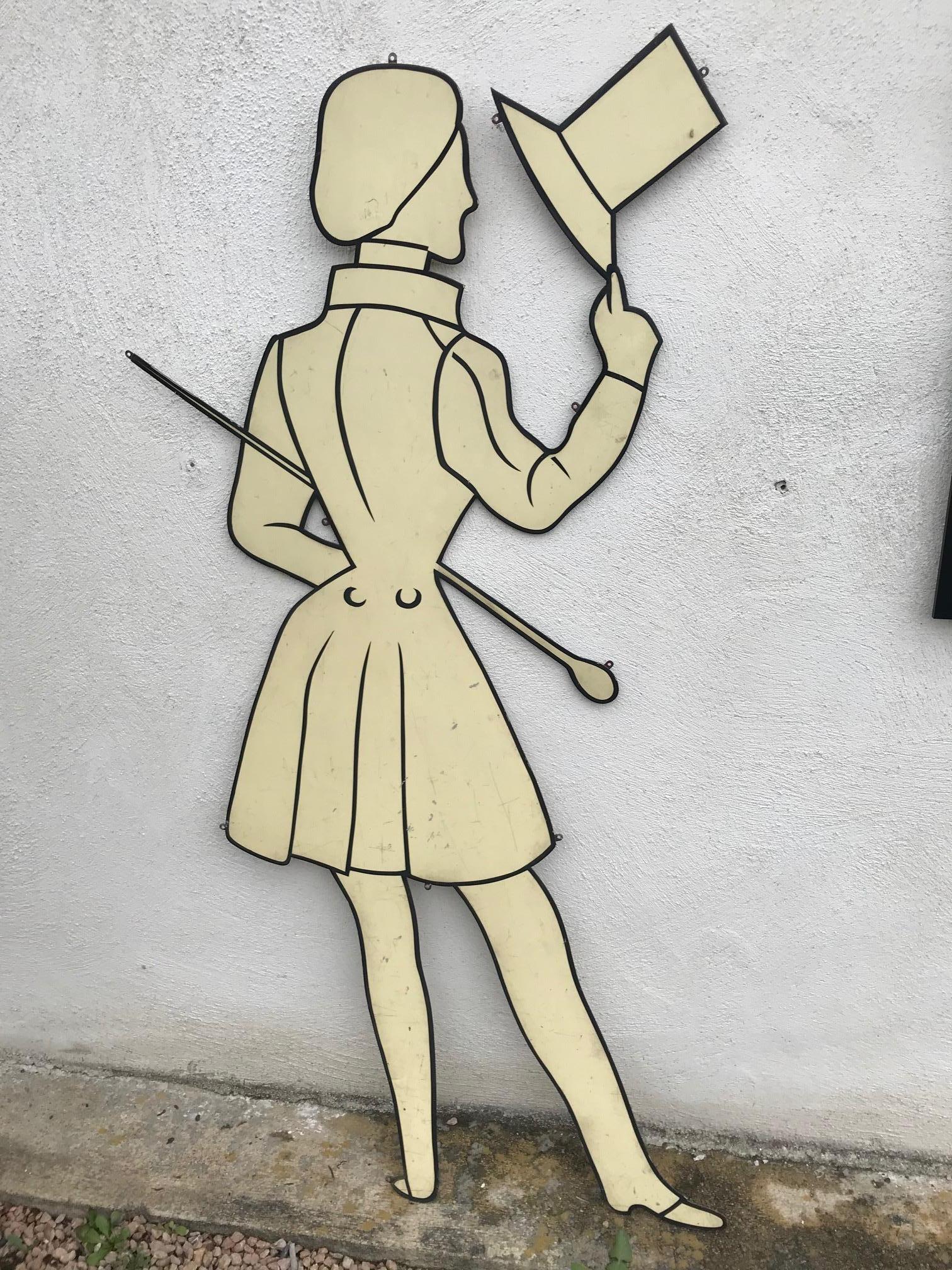 Very nice and rare 20th century French male metal silhouette from the 1950s.
This exceptional sign was used in a clothes shop.
We can see a man with a cane under the arm, a long jacket and a top hat.
There are small holes in the metal to hook the
