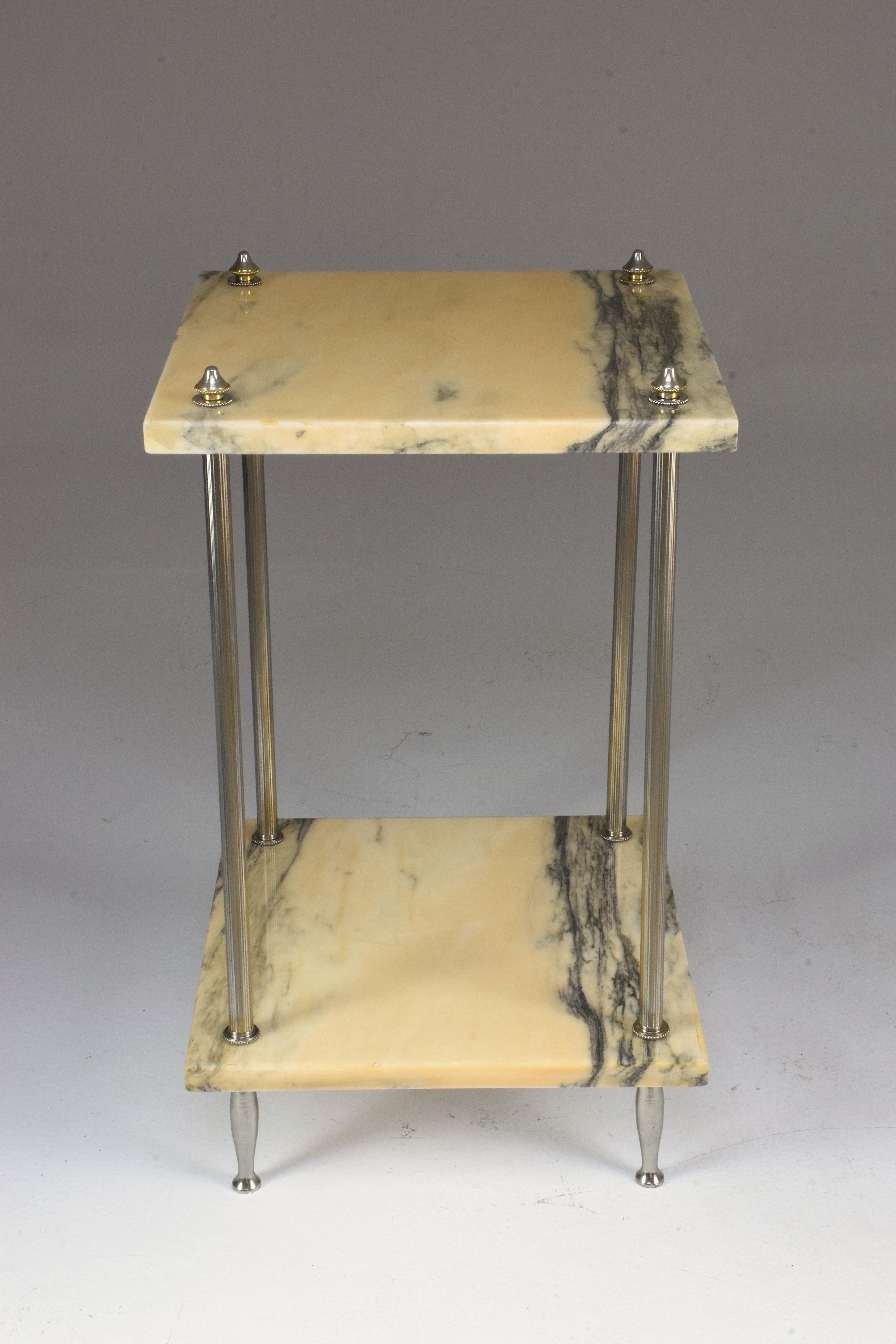 A 20th century French vintage console side table in a rare design from the 1970s composed of two white marble shelves and a chrome steel structure,
France, circa 1970s.

All our pieces are fully restored at our atelier and we only offer items that