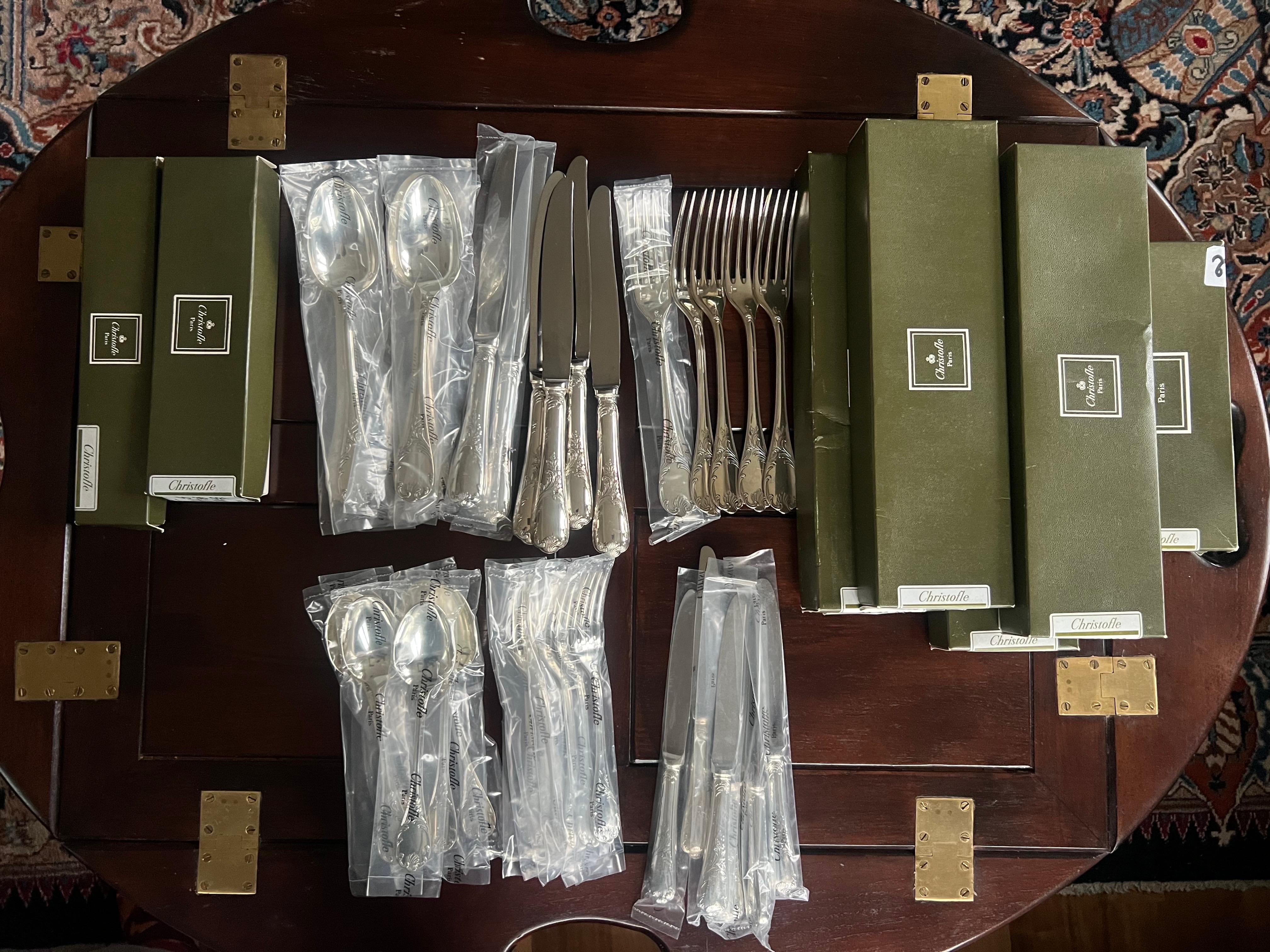 20th Century silver-plated Marly set by Christofle house. Brand new in original boxes, all are hallmarked and stamped. Perfect condition and full set.
A 110-piece silver-plated flatware set in the Marly pattern includes service for 12 guests.
It