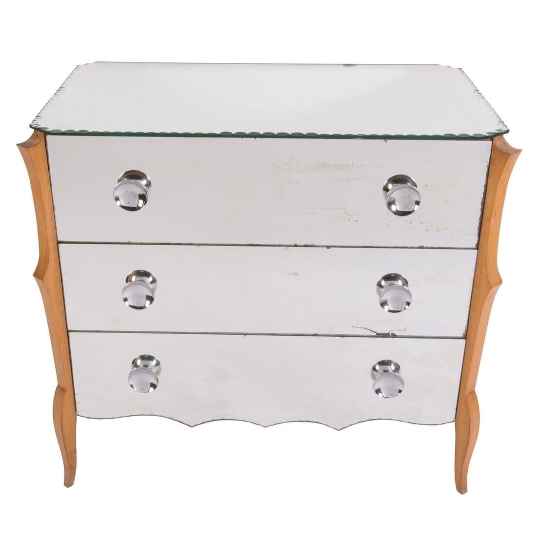 Mid-20th century French mirrored chest with scalloped decoration, circa 1960.