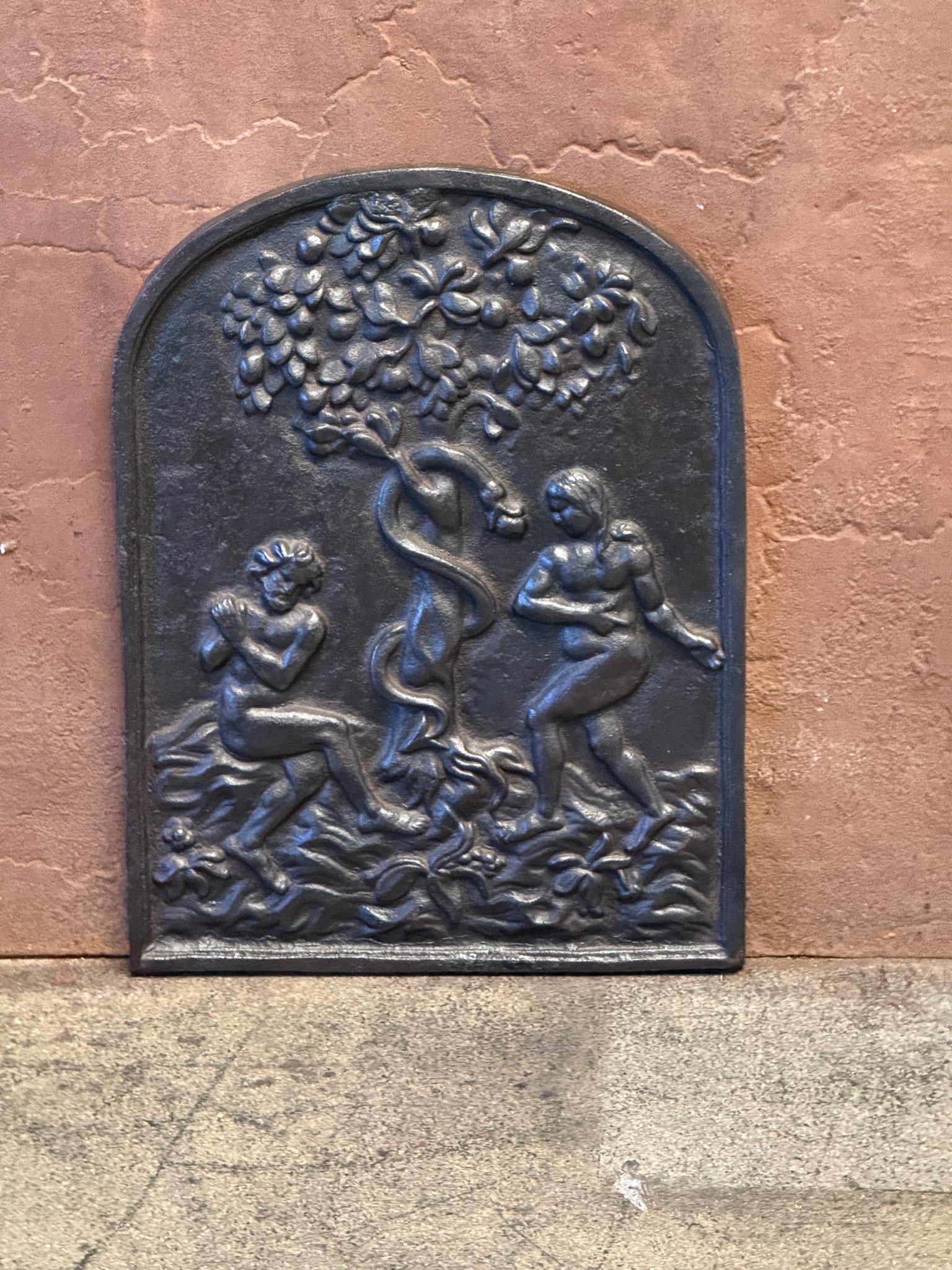 20th century French fireback with Adam and Eve. 

The fireback is made of cast iron and has a brown patina. It is in a good condition, without cracks.