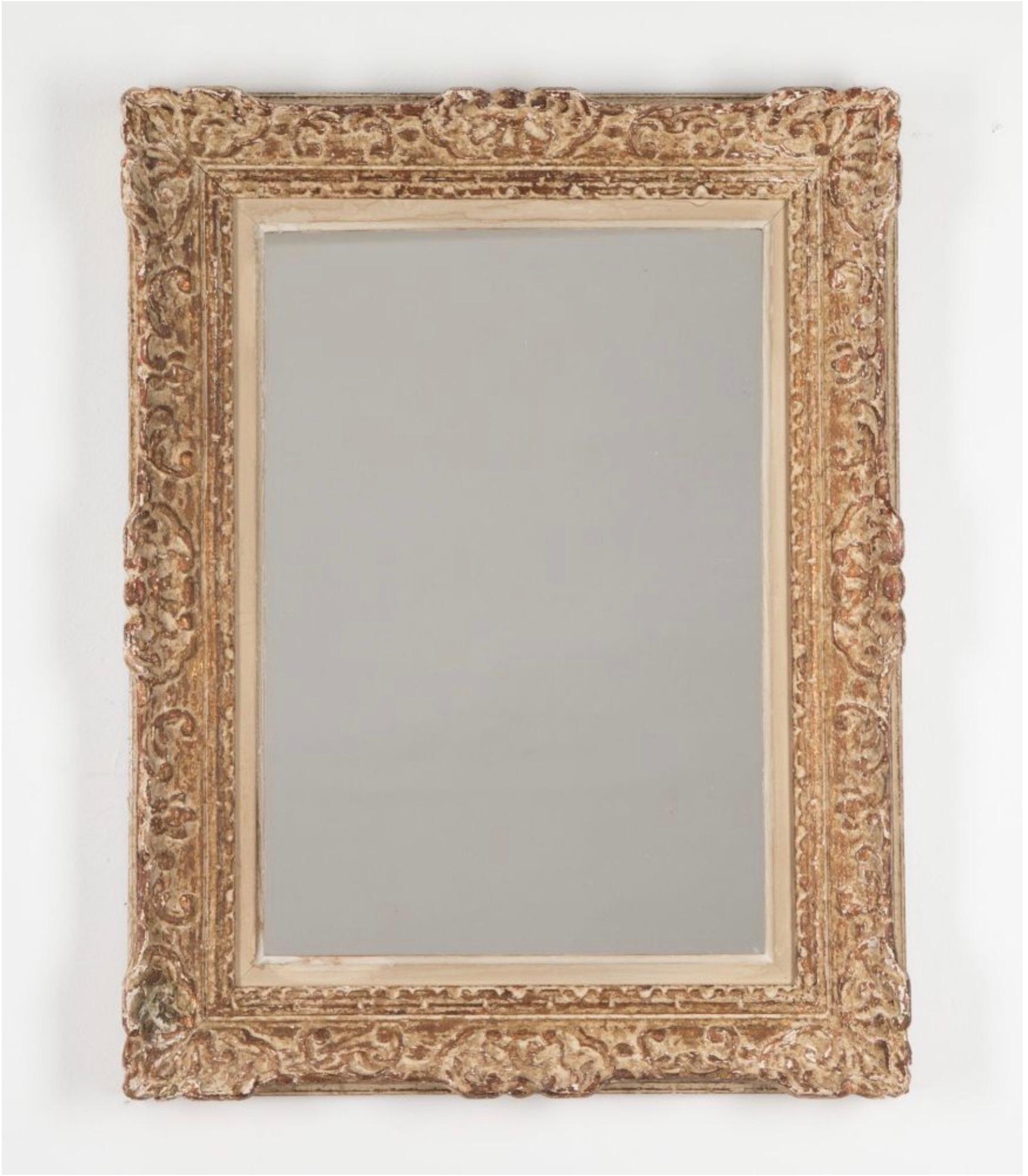 Superbe miroir à cadre sculpté Montparnasse du 20e siècle.

Belle patine peinte d'origine, avec de belles sculptures profondes.

Circa 1930.