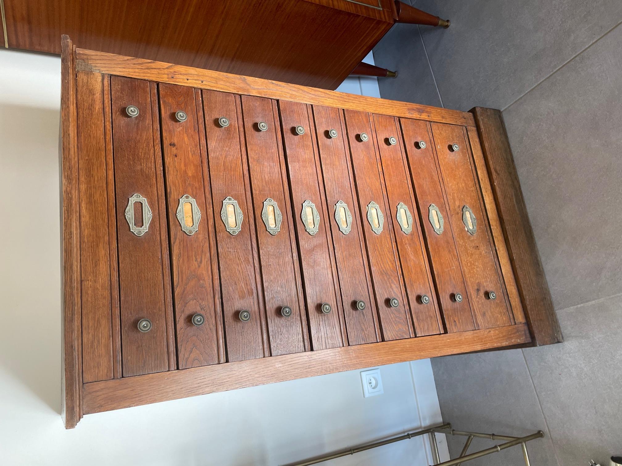 Very nice 20th century French oak and brass handles chests of drawers from the 1900s. 
Original metal Label holder. 
Good quality and condition. 
Use to be in a print company.