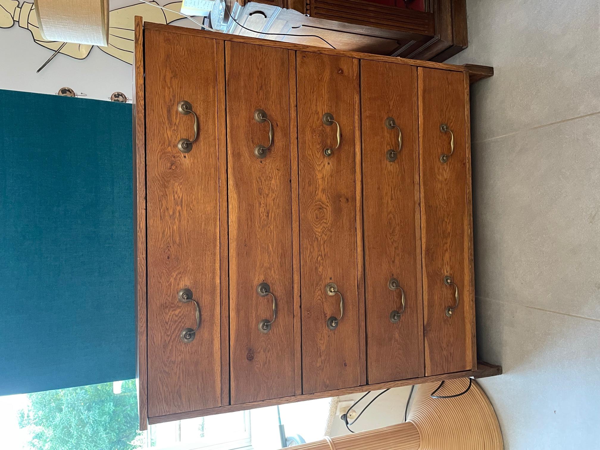 Very nice and rare 20th century French oak. 
Five drawers with brass handles. 
Nice quality and condition.