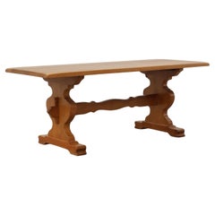 20th Century French oak trestle table with scalloped legs and plank top