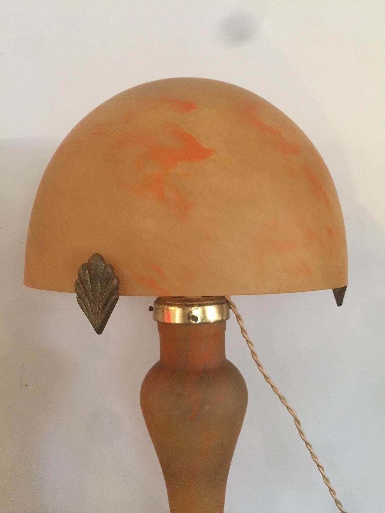 Very nice and original 20th century French orange molten glass table lamp from the 1950s signed by Vincent Garnier Paris.
Gilded brass fittings
Beautiful alight.