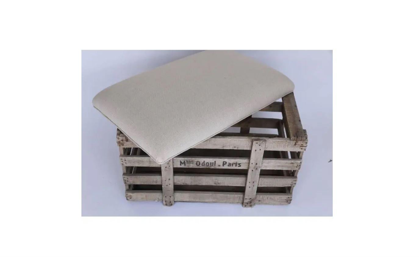 Found in the South of France, marked M O'doul, Paris, and fitted with a removable padded top this piece is a fun and useful bench with storage. The top is upholstered with an off-white linen blend. A perfect accent piece to store blankets or