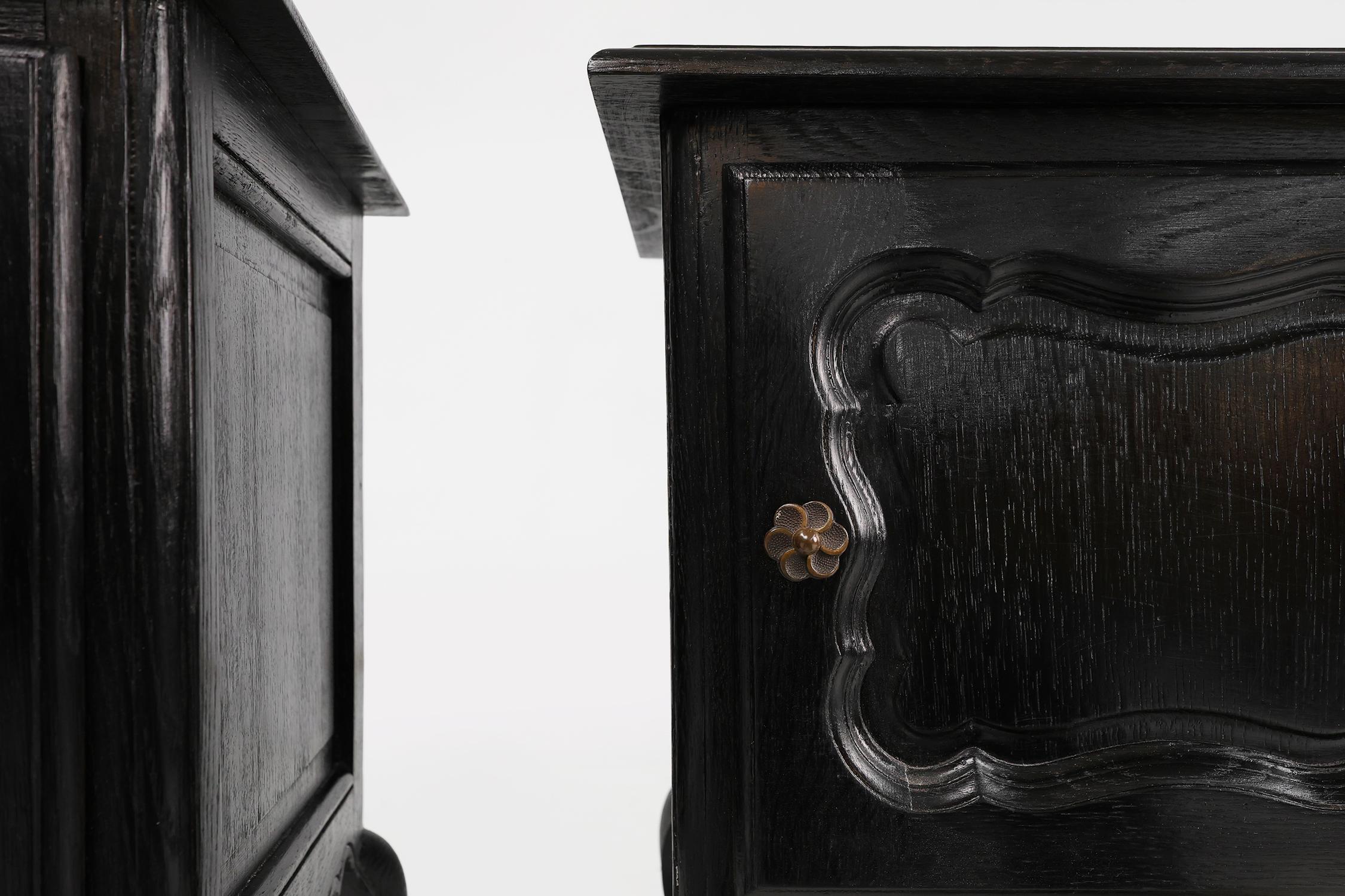 Carved 20th Century French pair of black nightstands in Louis XV style