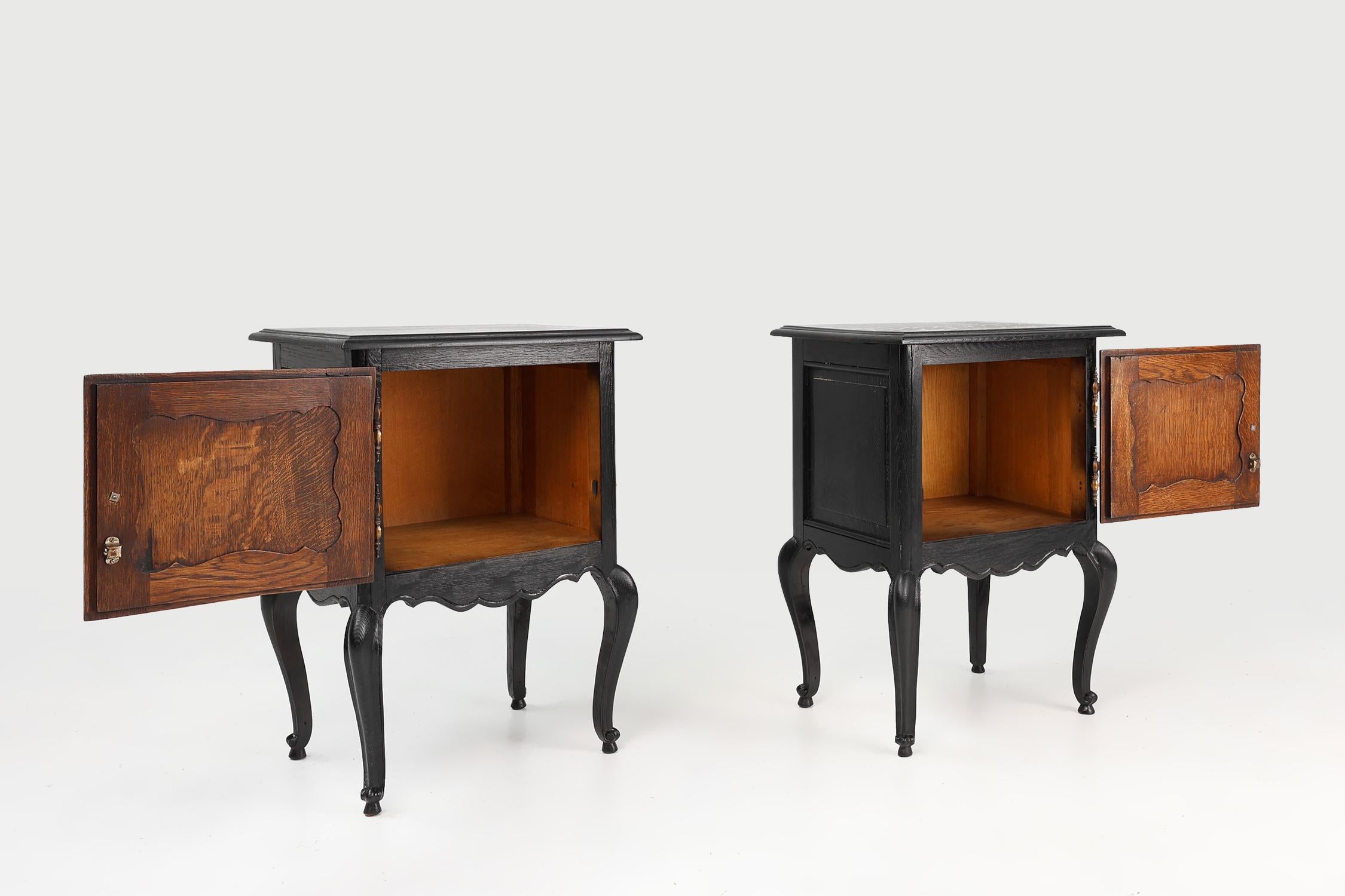 Wood 20th Century French pair of black nightstands in Louis XV style