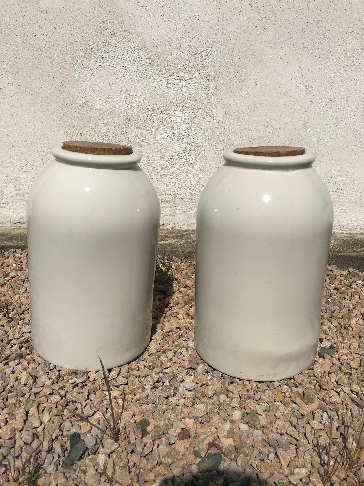 20th century French pair of sandstine salting container from the 1920s. 
Used to salt food. 
Two Cork plugs. 
Nice quality.