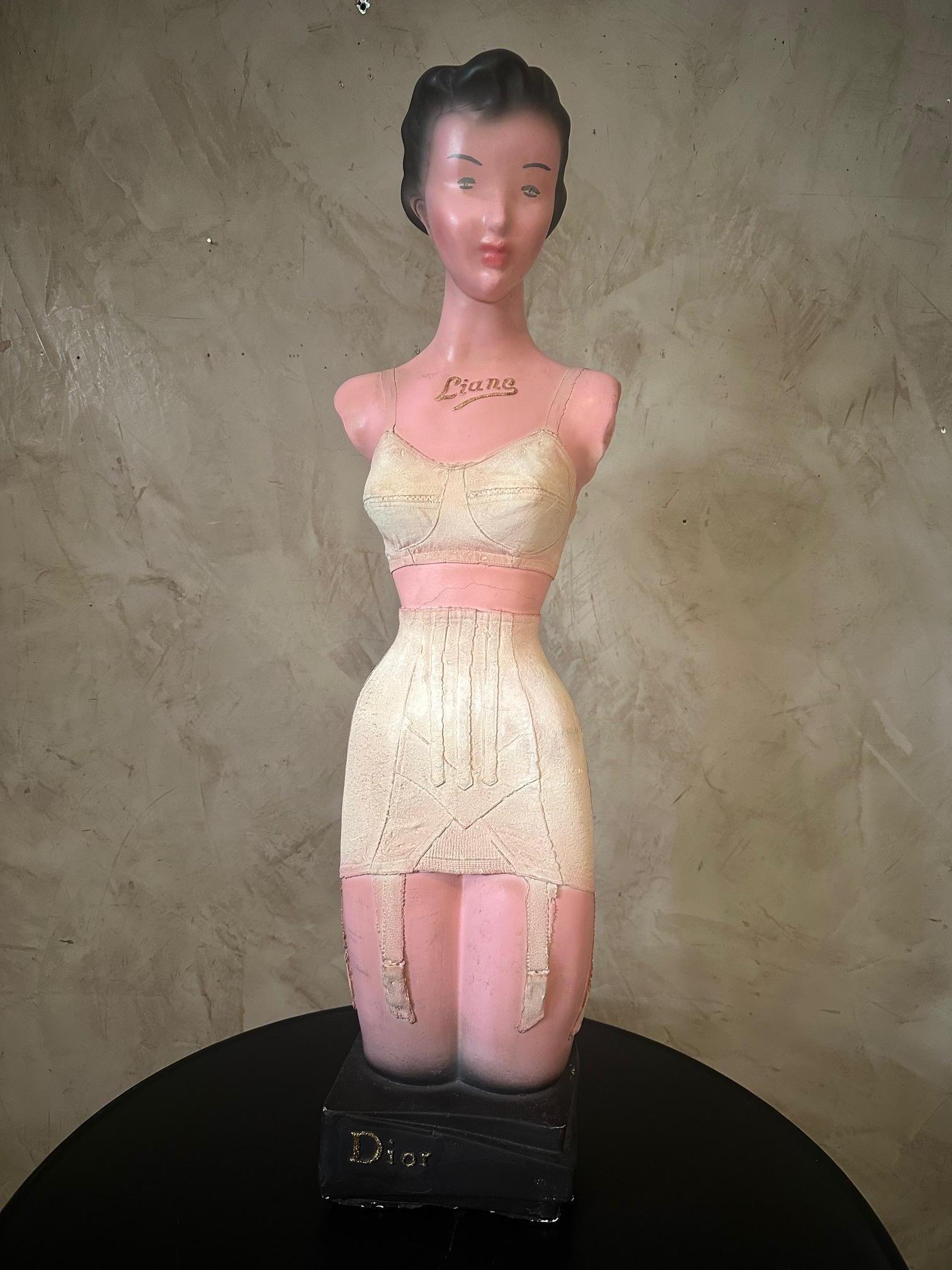 Very nice vintage 20th century Plaster made in the 1950s as an advertisement for the lingerie Liane for DIOR. 
Good condition for its age. 