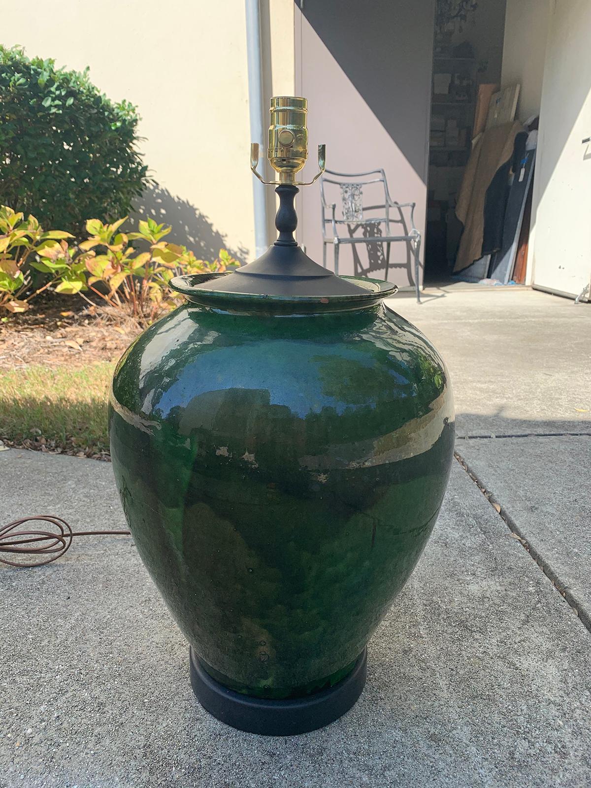 Large 20th century French Provincial glazed green terracotta pot as lamp, marked Poterie Provencale Aubagne, large scale.
New wiring.