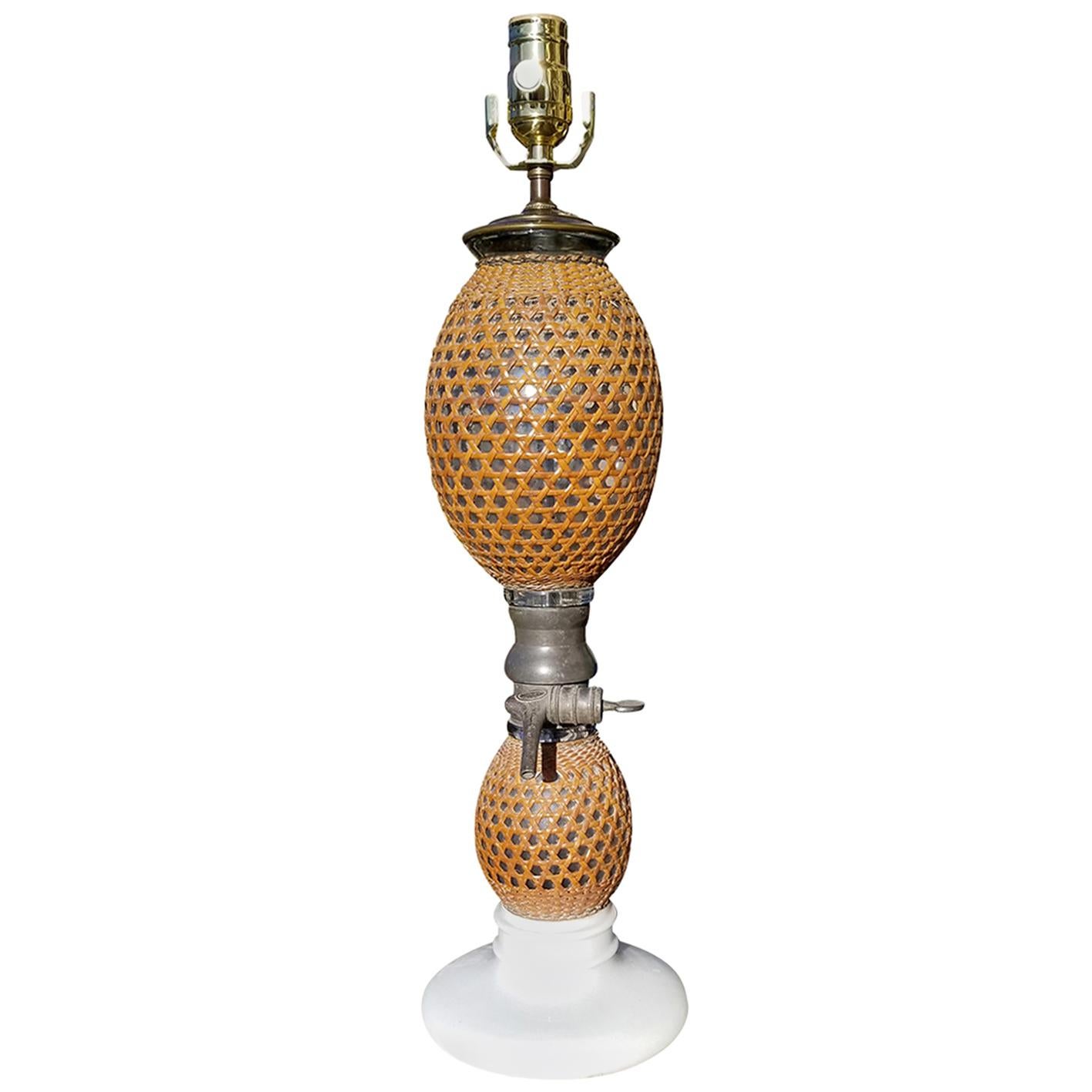 20th Century French Rattan Covered Glass Seltzer Bottle as Lamp For Sale