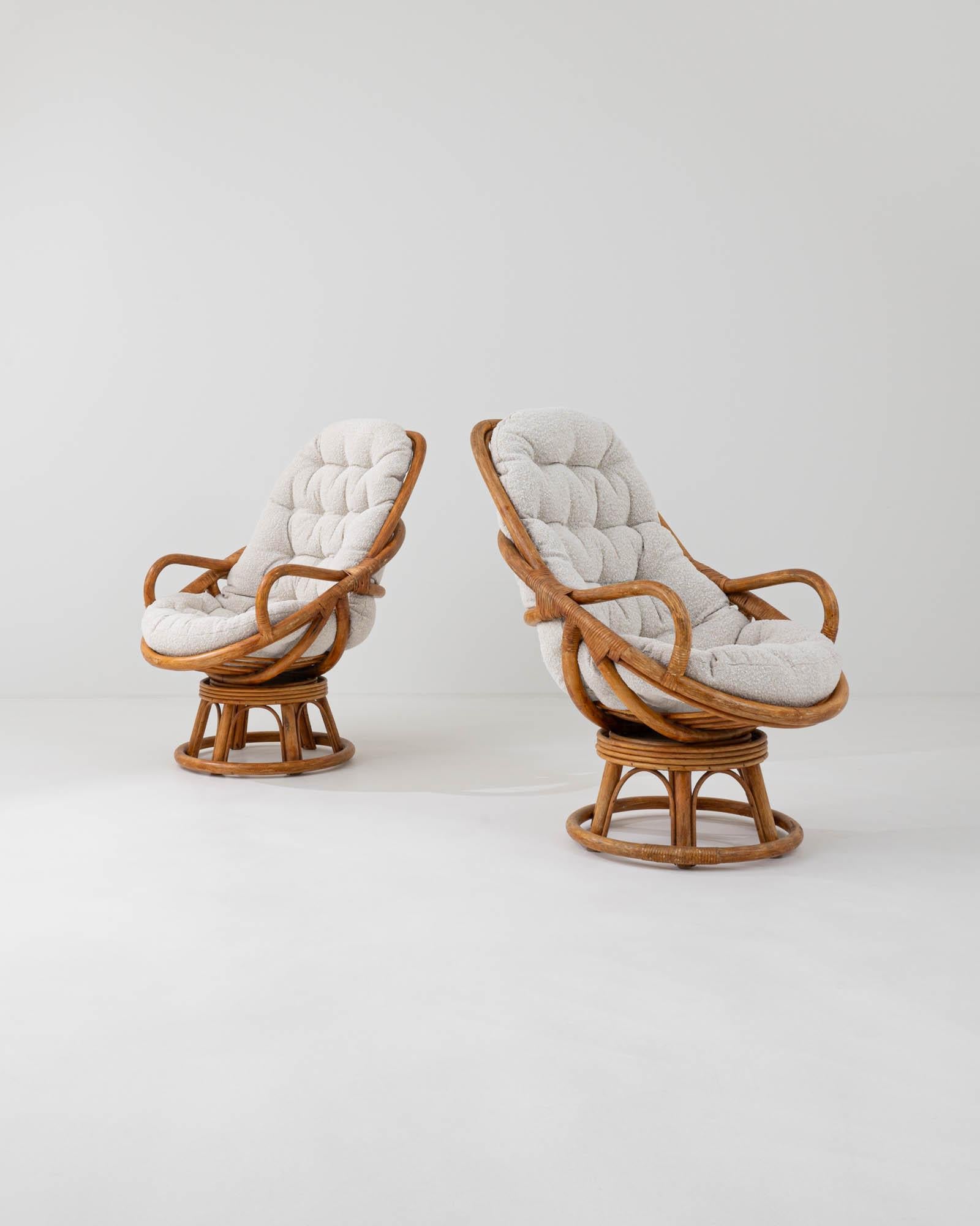 Upholstery 20th Century French Rattan Swivel Armchairs, a Pair