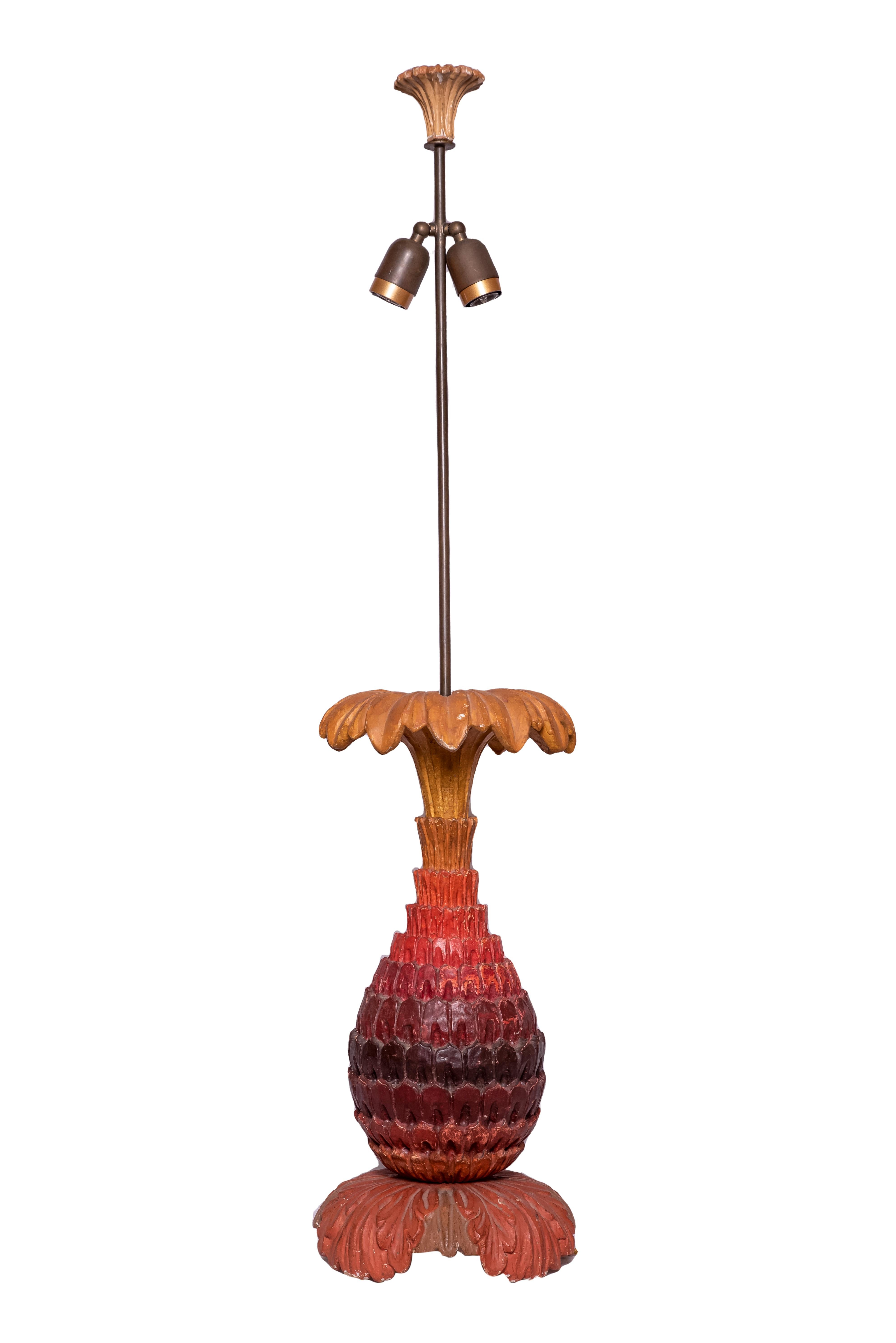 French red-orange painted wood carved pineapple table lamp by Maison Jansen. With circular white cotton shade.