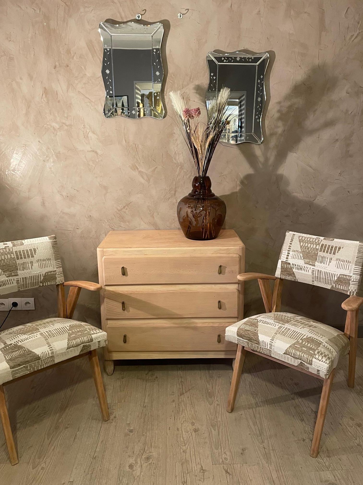 Very nice 20th century French pair of bridge chairs reupholstered by an experienced upholsterer with a beautiful French Fabric from the Nobilis house. 
The wood has been sanded to show a modern style. 
Very comfortable. Good quality and condition.