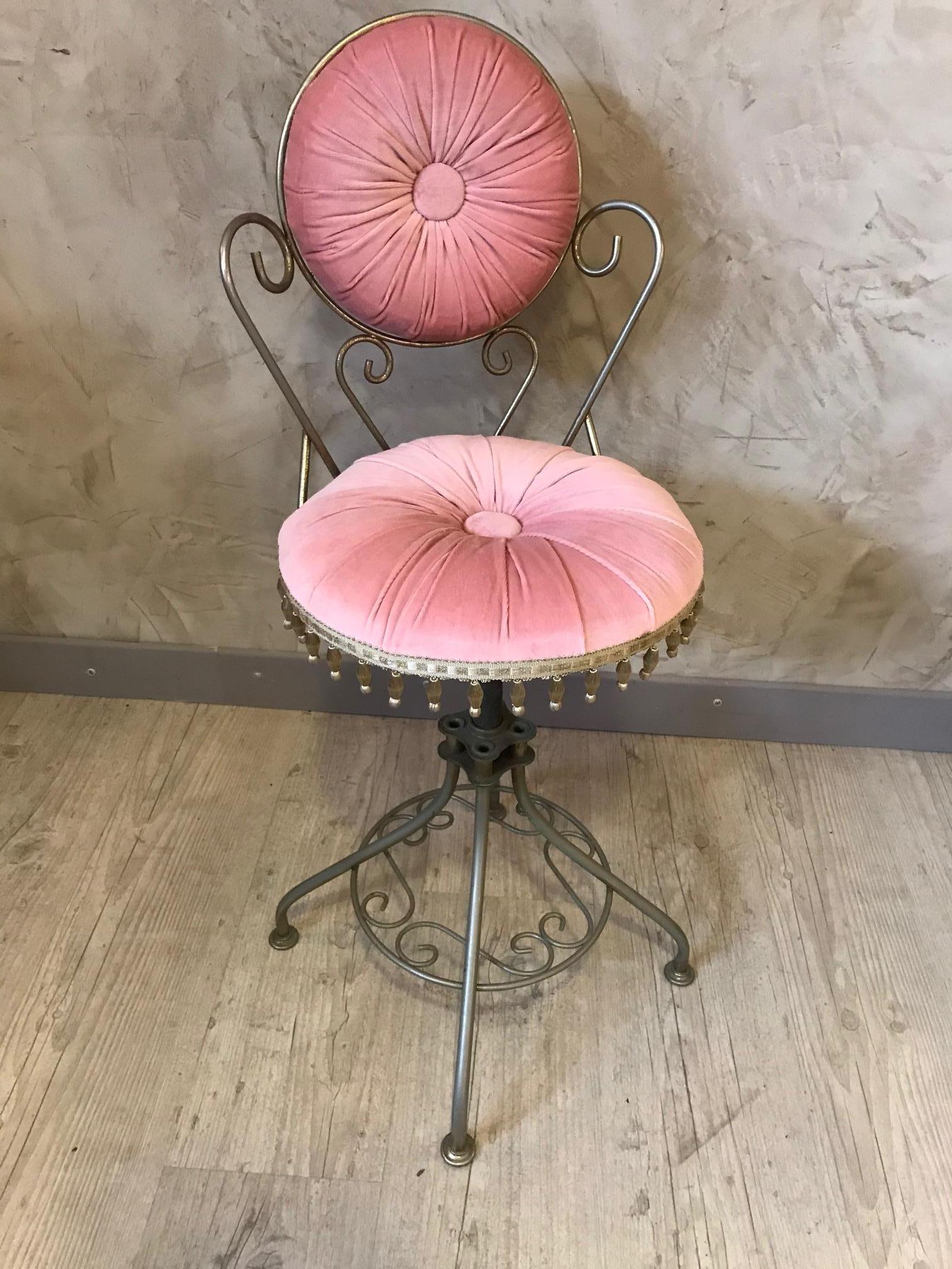 Very elegant and rare chair from the 1950s entirely reupholstered with a beautiful pink velvet and a beige braid to finish. Metal base. 
This chair is adjustable in height.
Very nice quality and perfect condition.