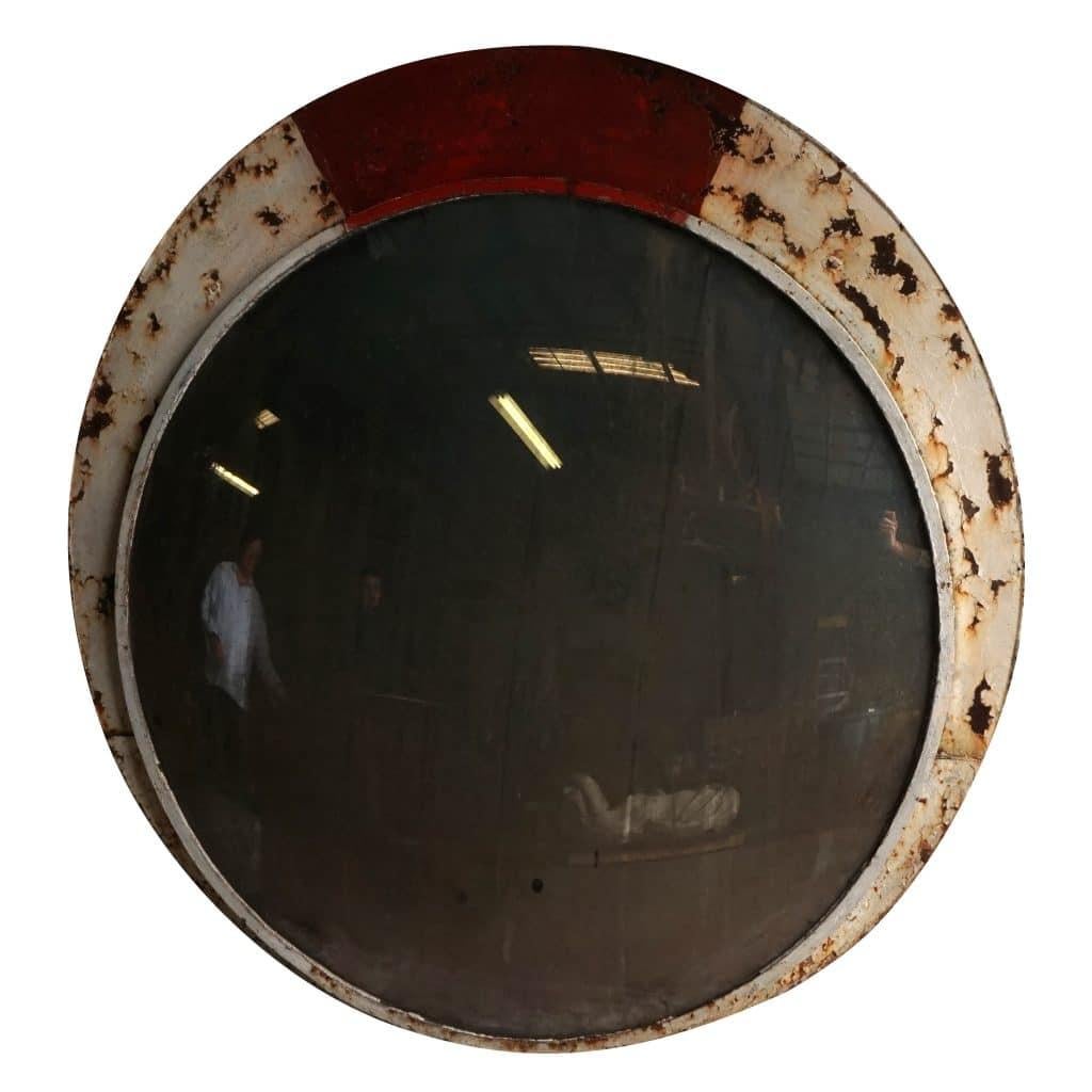A large round, vintage Art Deco French industrial designed convex wall mirror in its original distressed condition. Wear consistent with age and use, circa 1940, France.