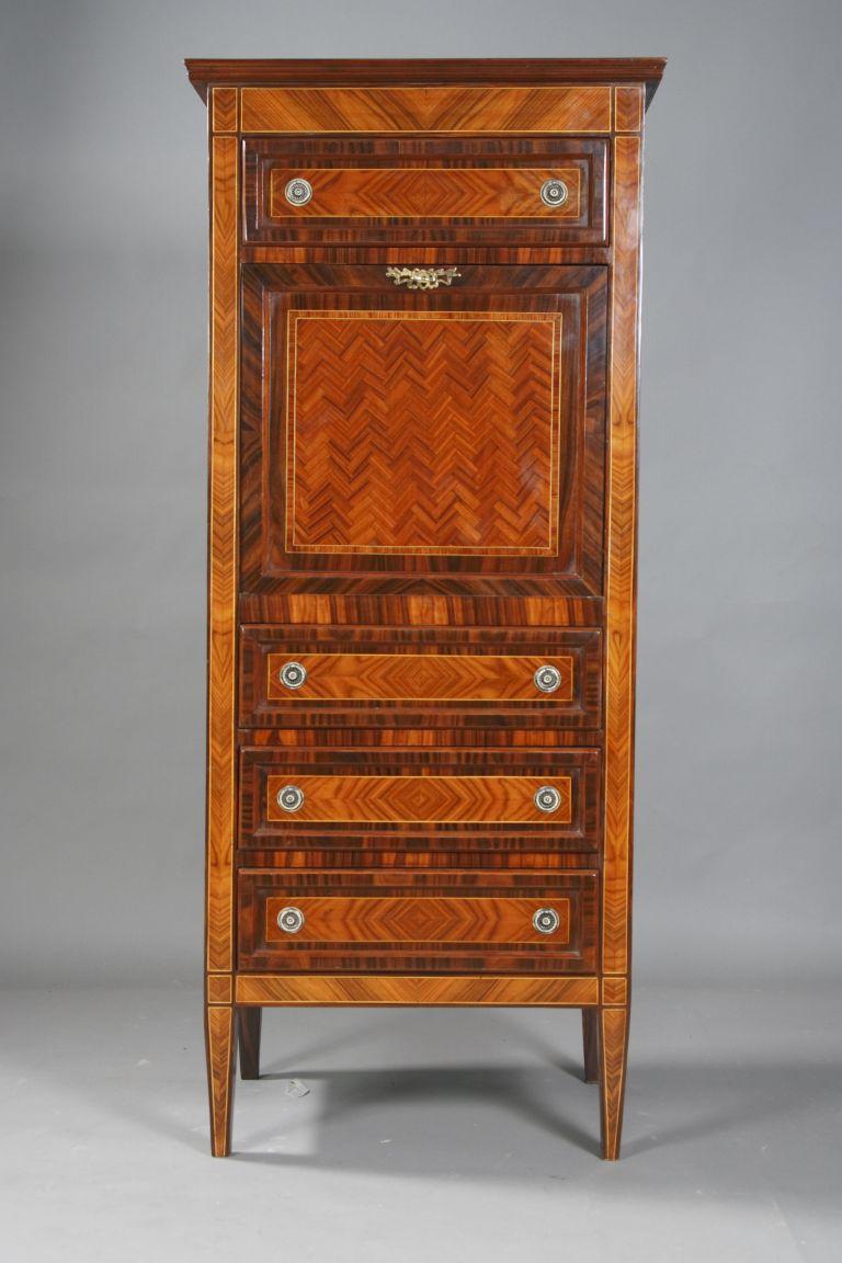 Palisander mirror veneer on solid softwood. Rectangular body on pointed legs. In the front between four drawers straight flap. Behind it rich office layout. The sides and the front are framed with panels, decorated with parquet-like marquetry.