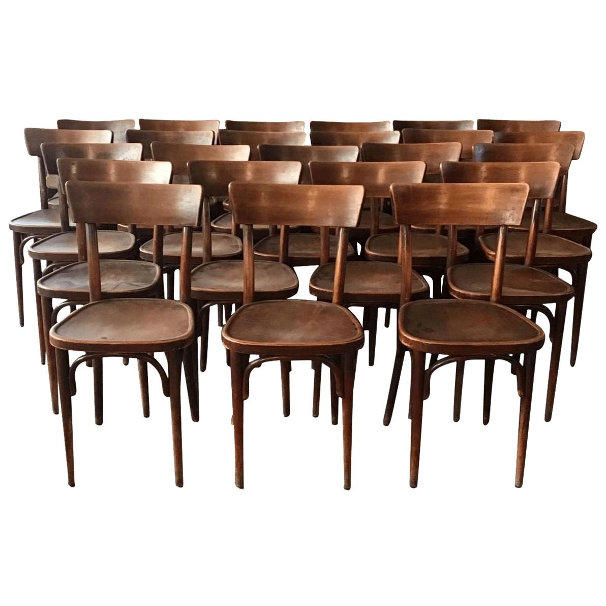 20th Century French Set of 24 Dark Brown Wooden Bistro Chairs. 1930s For Sale