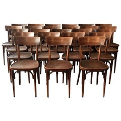 20th Century French Set of 24 Dark Brown Wooden Bistro Chairs. 1930s