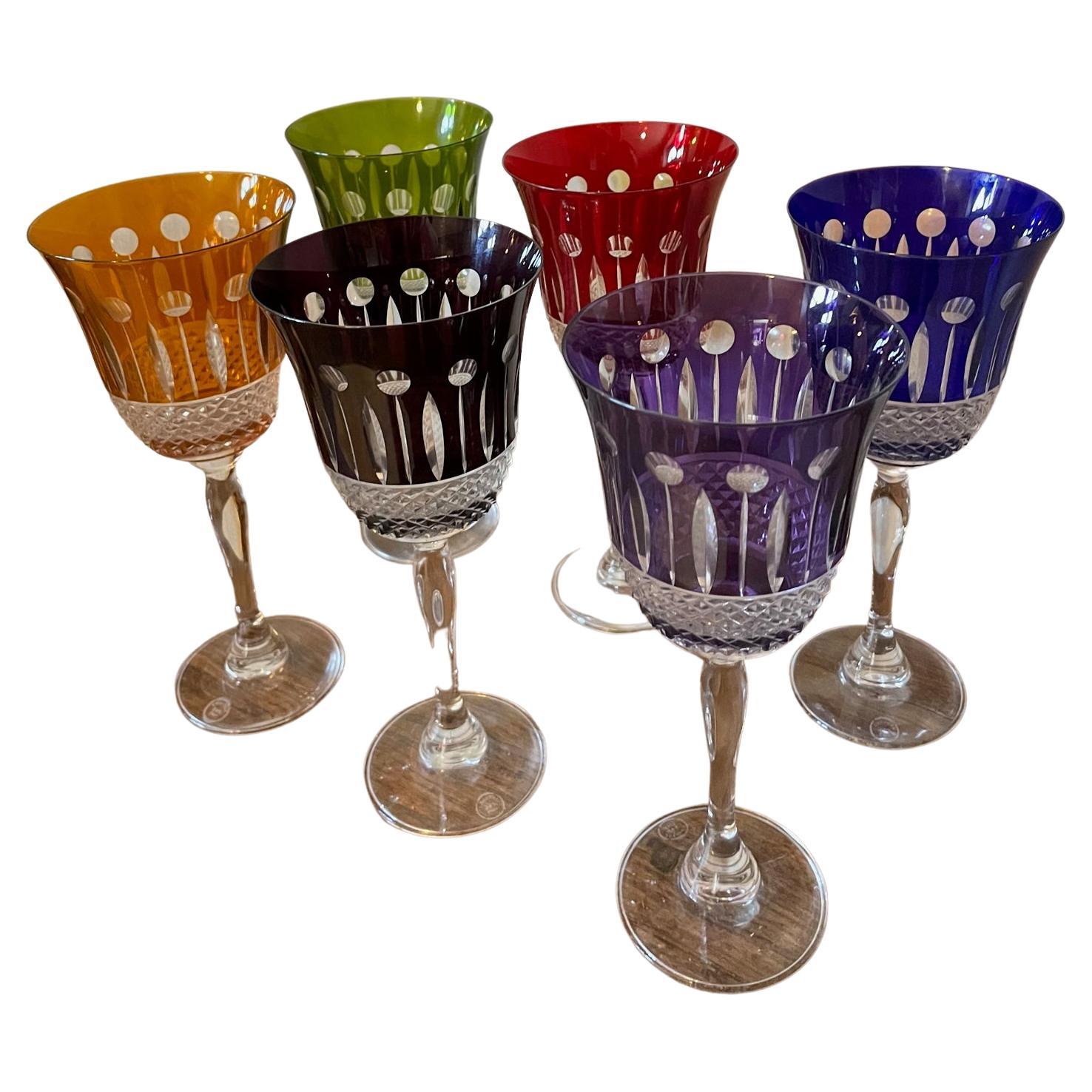 Very nice 6 crystal colored glasses made by the cristallerie de Paris. 
Red, green, orange, black, blue and purple. 
Nice engraved work. Very good quality and condition.