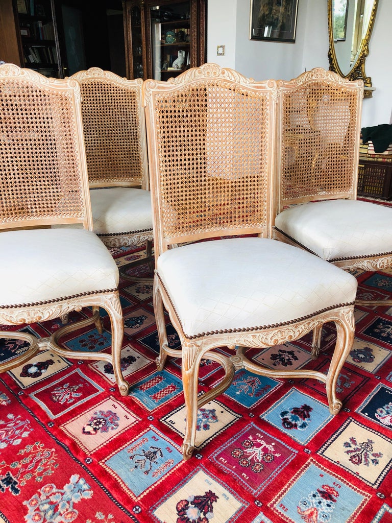Wooden hand carved set of four dining chairs in light beige upholstery.
Very stable structure and comfortable seat.
Very good condition.
France, circa 1920.