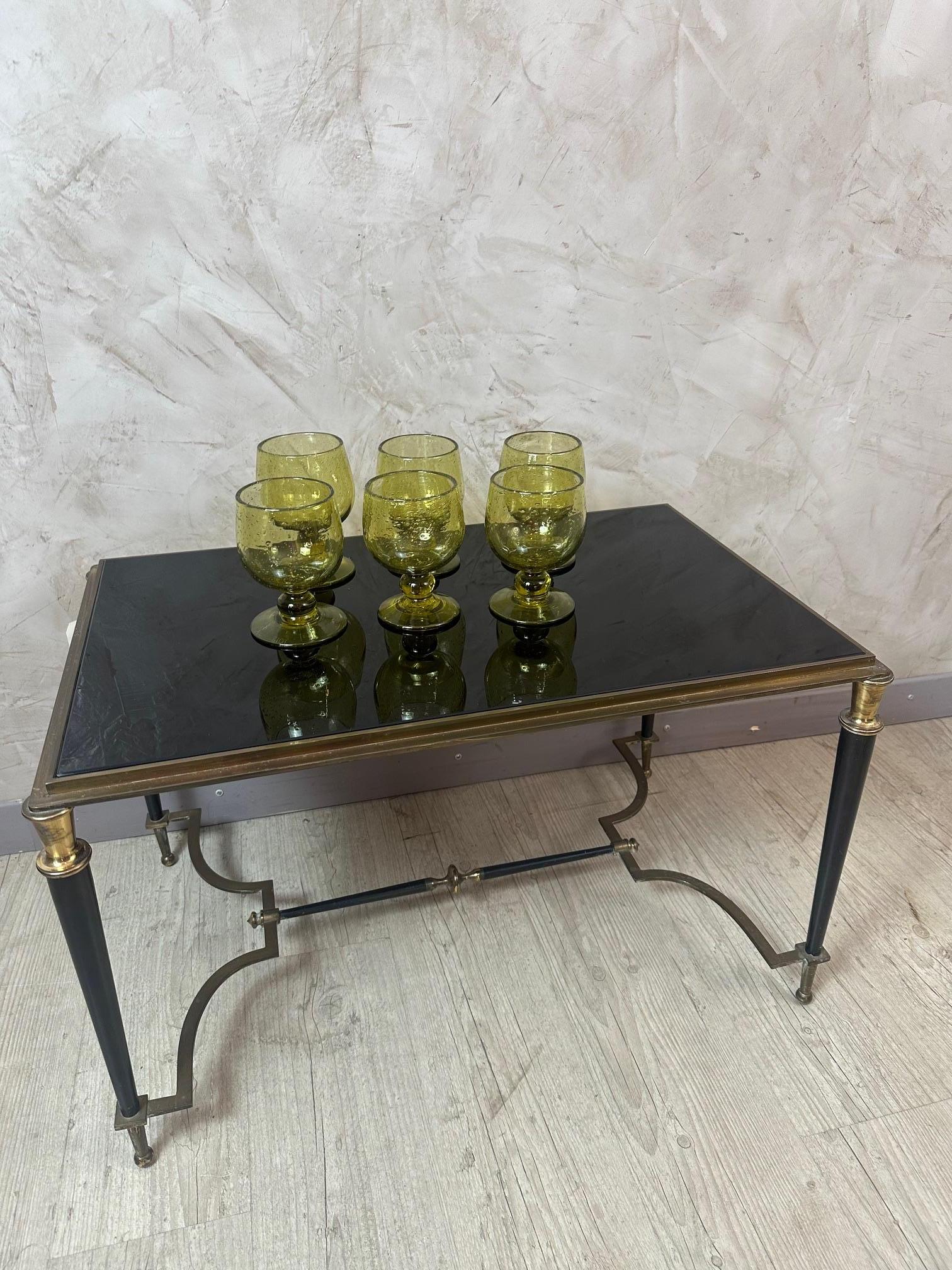 Elevate your aperitifs with this set of 6 amber yellow blown glass cocktail glasses from the renowned Biot manufacture. Each piece is unique, featuring the characteristic bubbles that reflect exceptional artisanal craftsmanship. Each glass is signed